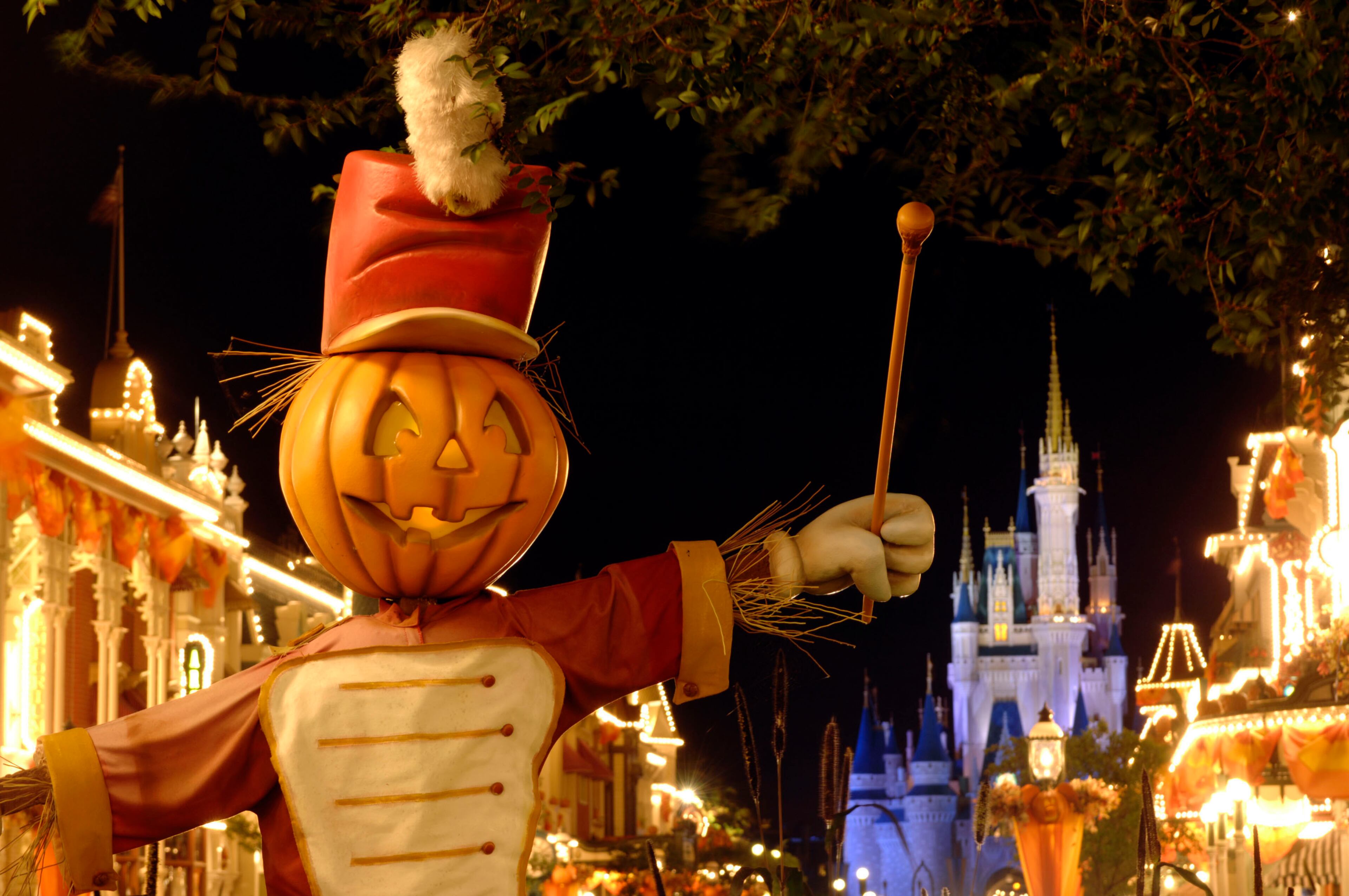 A Jack-O-Lantern bandleader entertains the crowd on Main Street, U.S.A., in the Magic Kingdom at Walt Disney World in Lake Buena Vista, Fla.