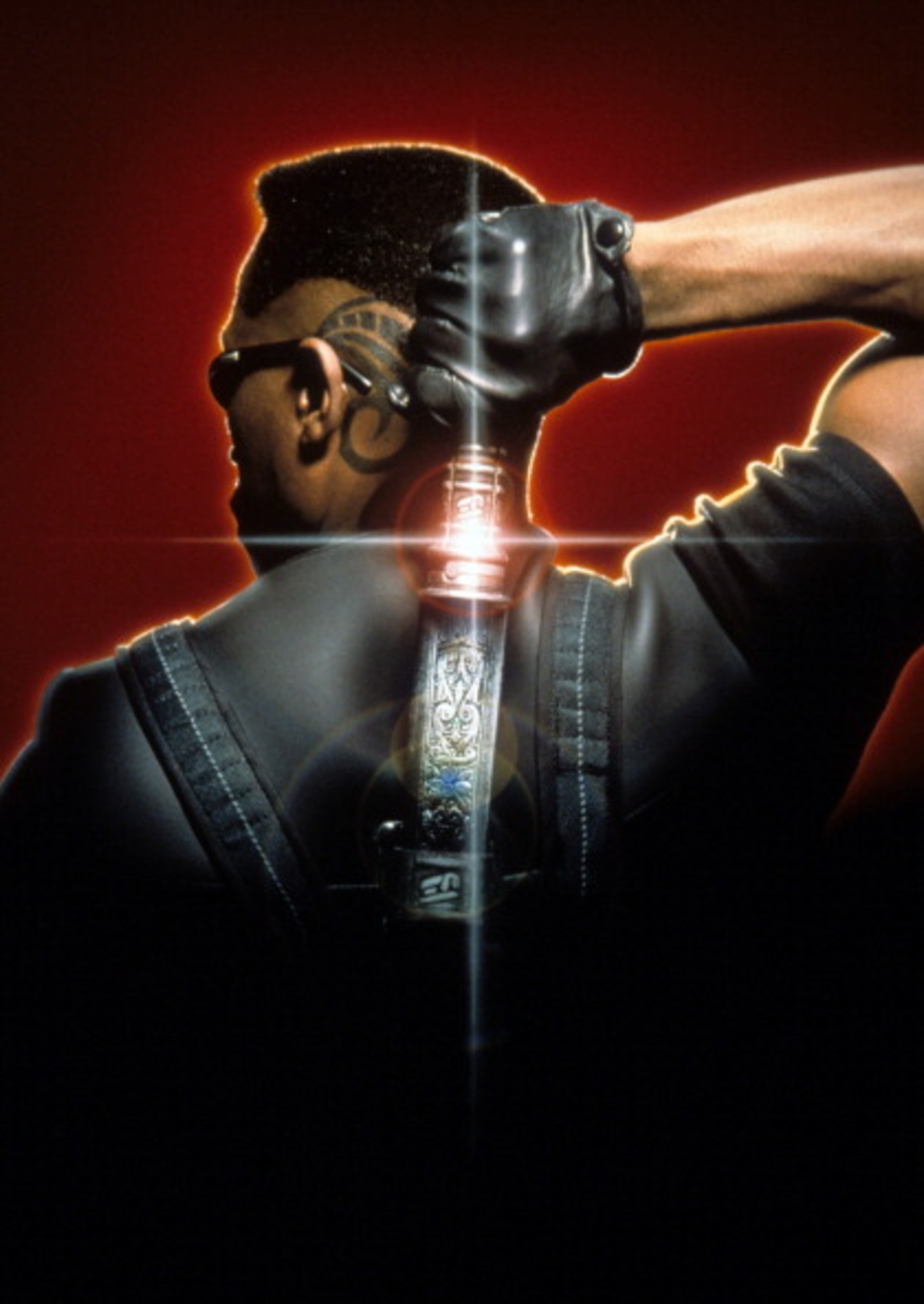 Wesley Snipes holding a dagger behind his back in a scene from the film 'Blade', 1999. (Photo by Amen Ra Films/Getty Images)