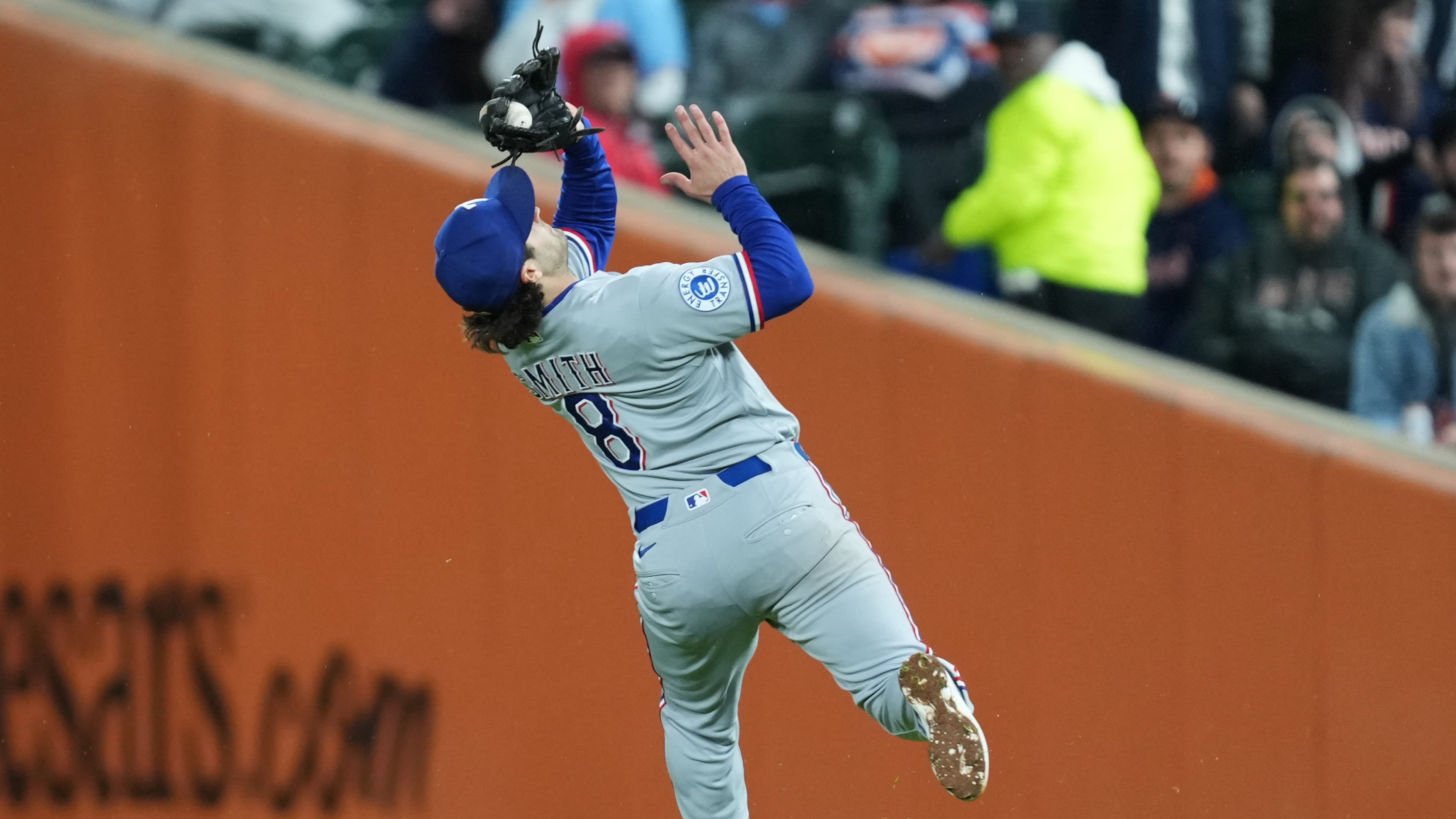 Texas Rangers second baseman Josh Smith (8) catches a Detroit Tigers' Matt Vierling fly ball during the fifth inning of a baseball game Friday, May 1, 2026, in Detroit. (AP Photo/Paul Sancya)