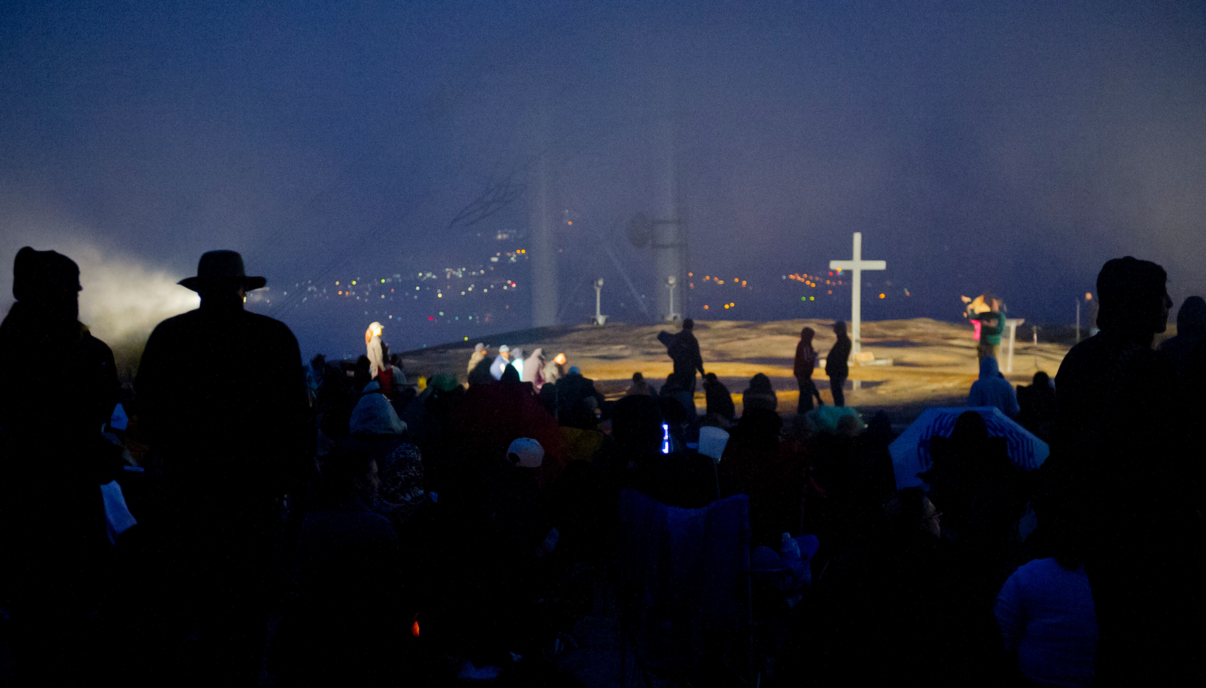 Thousands gather for the service.