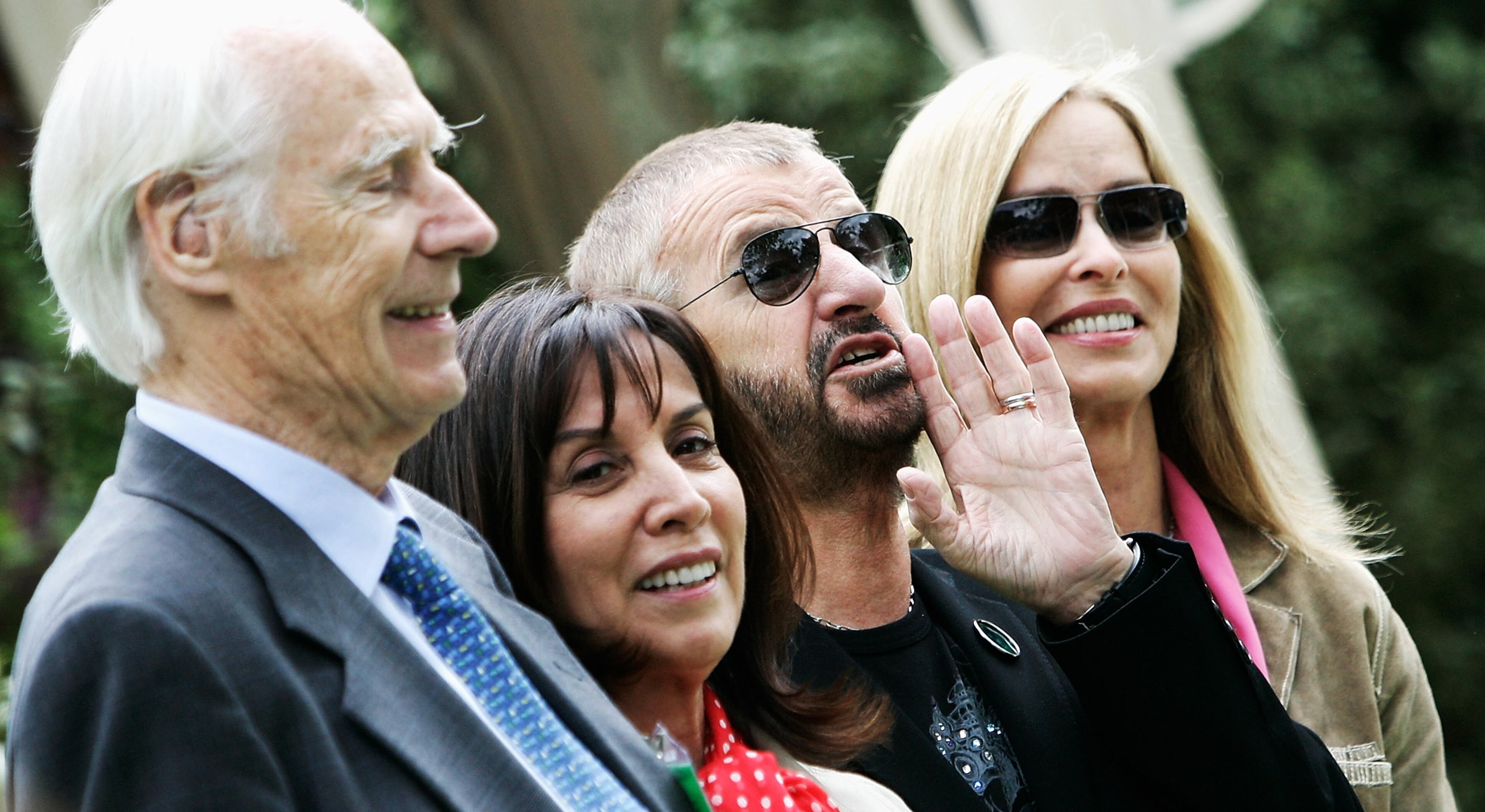 LONDON - MAY 19: Producer George Martin, George Harrison's wife Olivia Harrison, Former Beatle Ringo Starr and Barbara Bach pose for a photograph in the 'From Life to Life, A Garden For George' Garden during the Press and VIP day for Chelsea Flower Show 2008 on May 19, 2008 in London, England. (Photo by Chris Jackson/Getty Images)