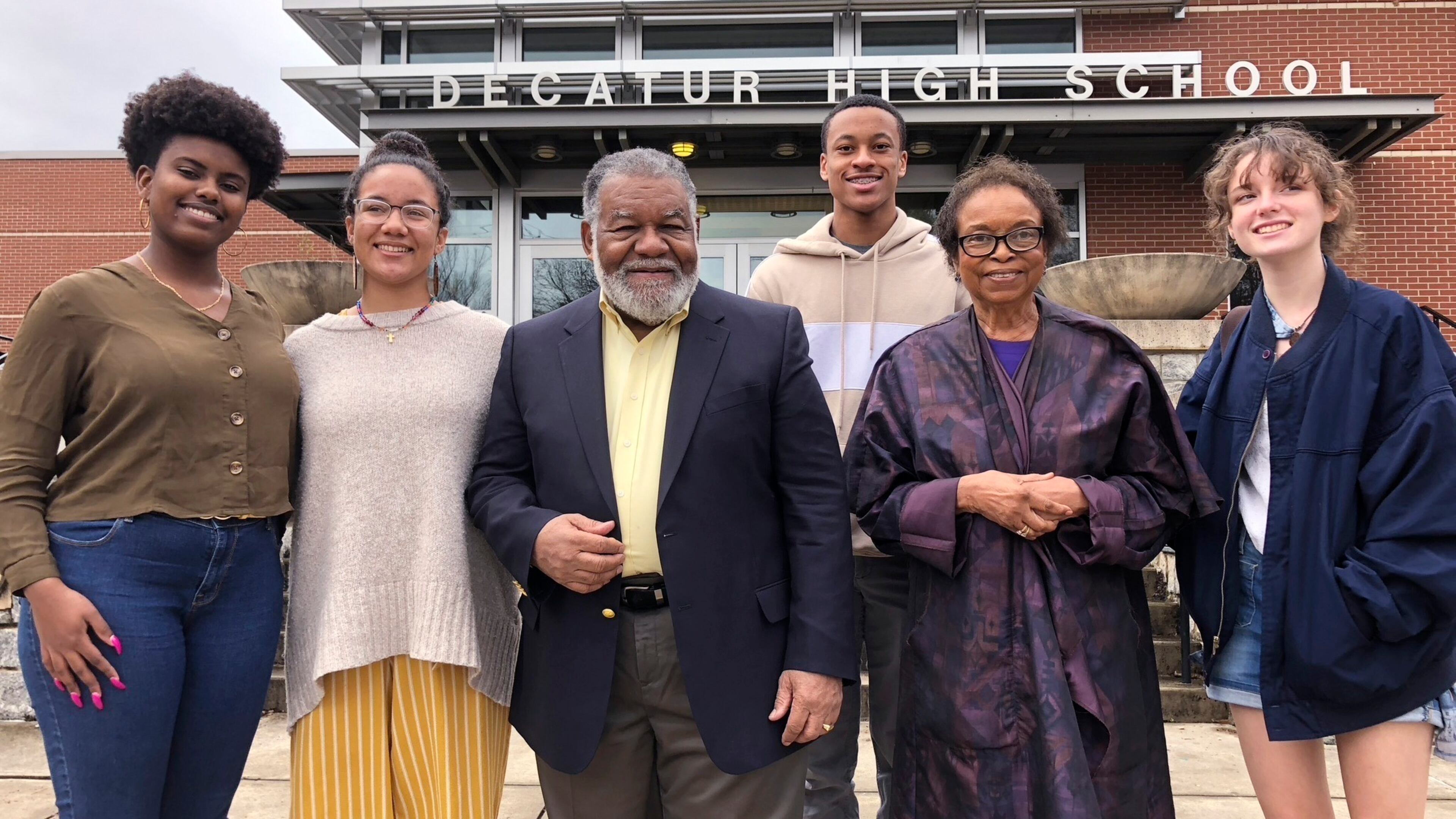 Students Genesis Reddicks, Liza Watson, Daxton Pettus and Emma Callicutt pose with Charles Black and Roslyn Pope outside Decatur High School in Decatur, Georgia. Pope, who wrote "An Appeal for Human Rights" as a Spelman College student in March 1960, and Black, who co-founded the Atlanta Student Movement as a Morehouse College student that year, spoke at the school about their efforts to hasten the end of racial segregation in the South 60 years ago.