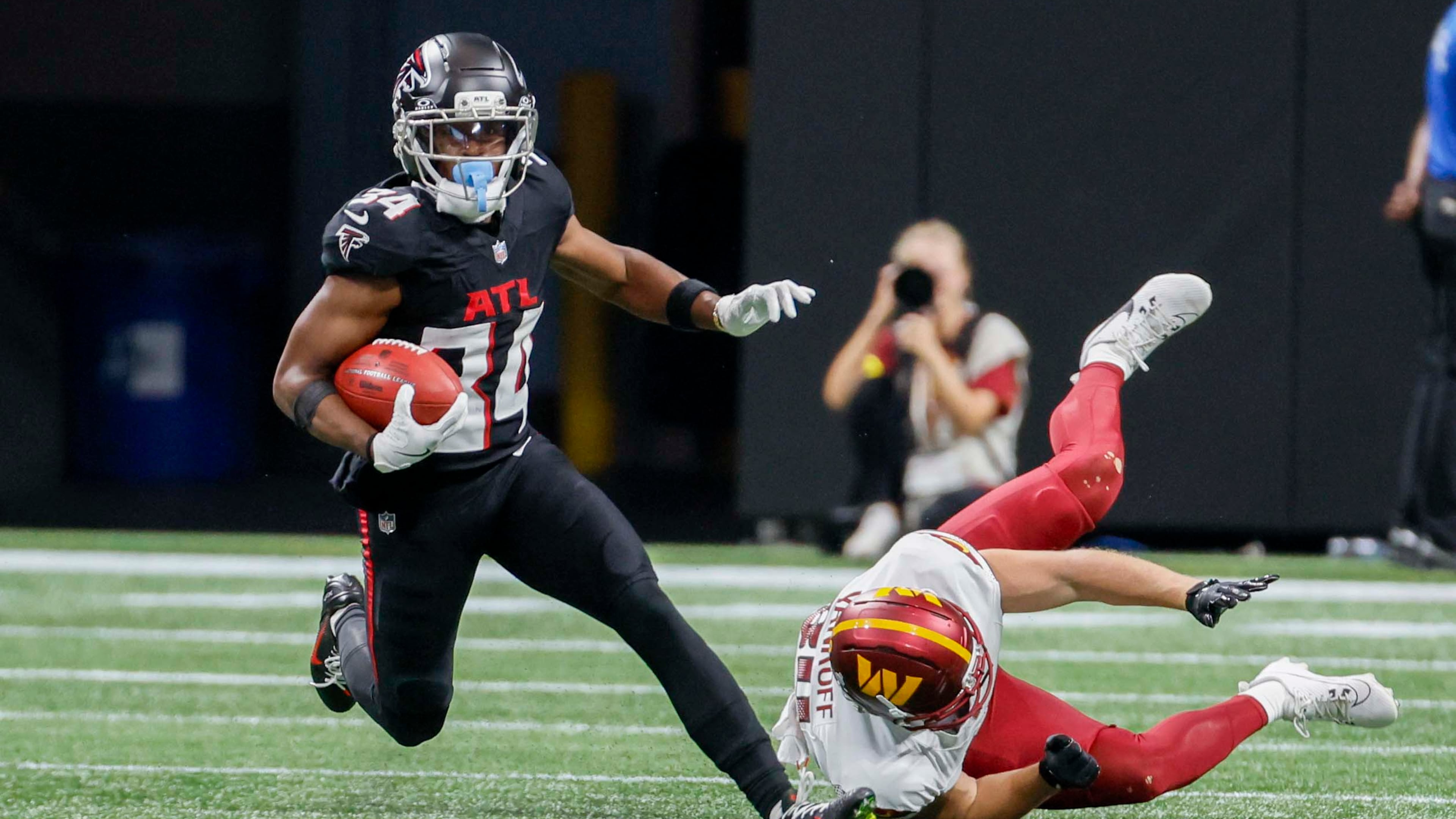 Falcons wide receiver Ray-Ray McCloud breaks a tackle during the second half of a game against the Washington Commanders at Mercedes-Benz Stadium in Atlanta on Sunday, Sept. 28, 2025. (Miguel Martinez/AJC)