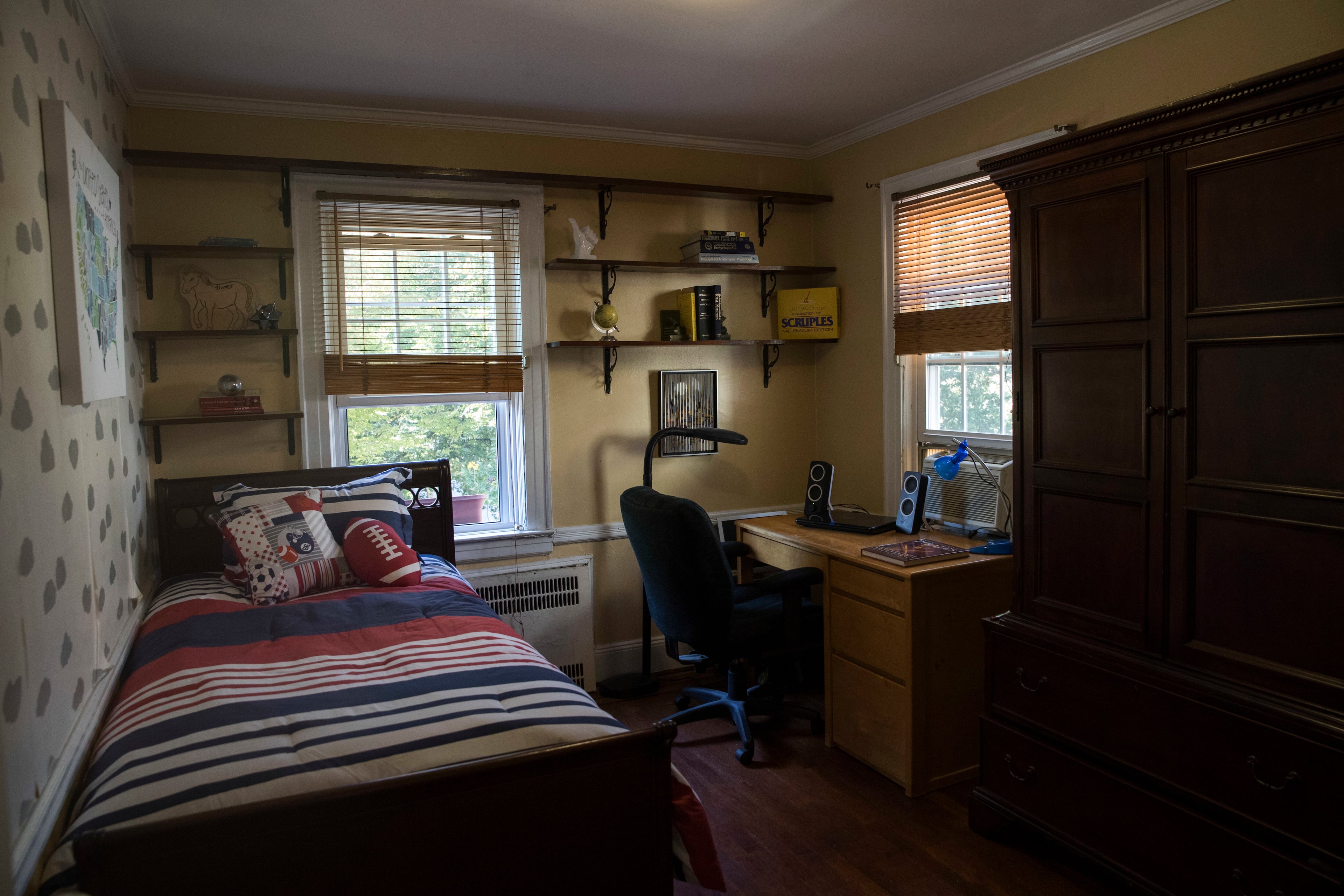 This Tuesday, Oct. 18, 2016 photo, shows a bedroom in the house where Republican presidential candidate Donald Trump spent his early childhood in the Jamaica Estates neighborhood of the Queens borough of New York. Trump's first boyhood home in New York City is going on the auction block with an opening bid of $849,000. (AP Photo/Mary Altaffer)