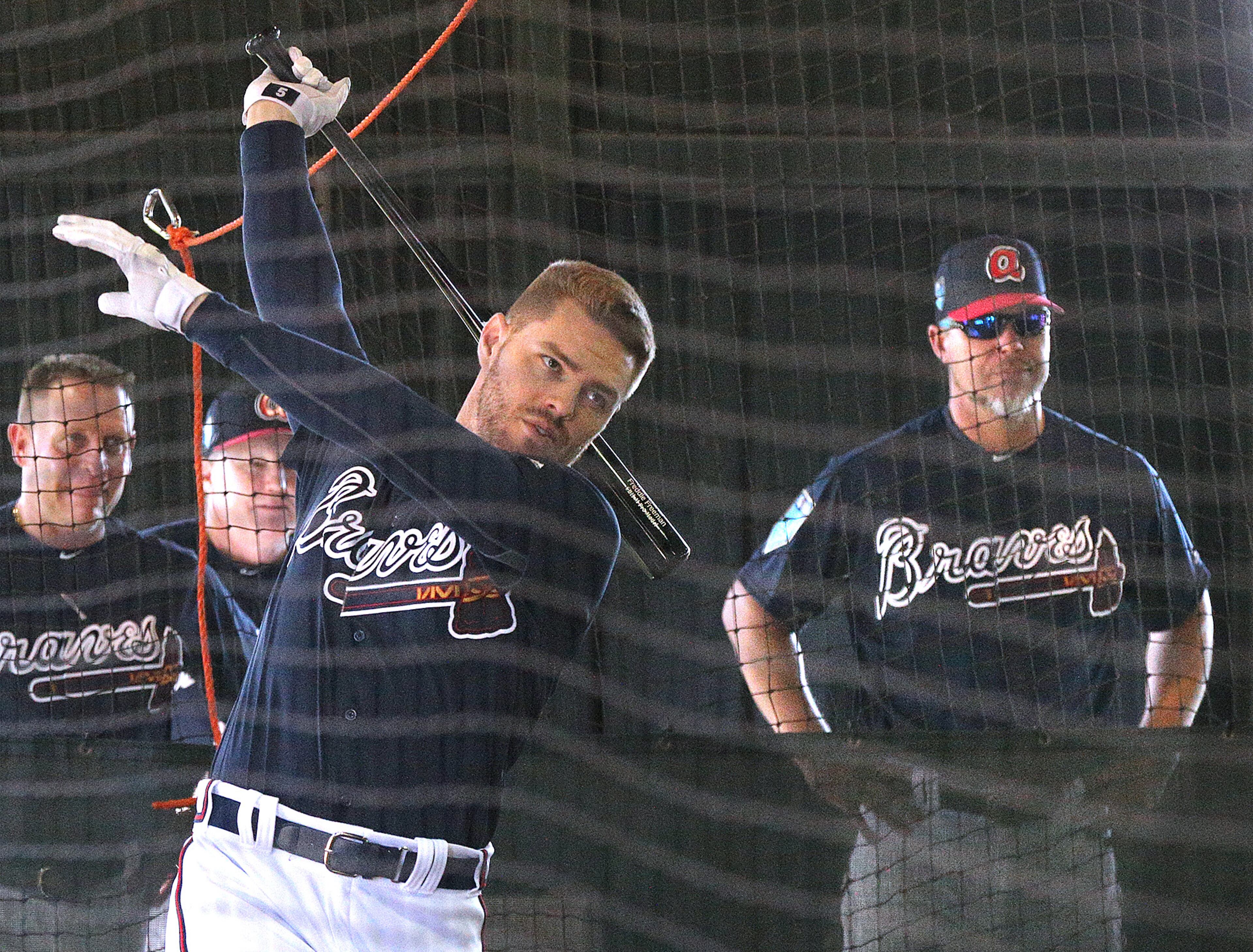 Feb 19, 2018 Lake Buena Vista: Braves recently elected Hall of Fame third baseman Chipper Jones watches Freddie Freeman take swings in the batting tunnels while spending a day helping coach spring training during the first full squad workout on Monday, Feb 19, 2018, at the ESPN Wide World of Sports Complex in Lake Buena Vista. Curtis Compton/ccompton@ajc.com