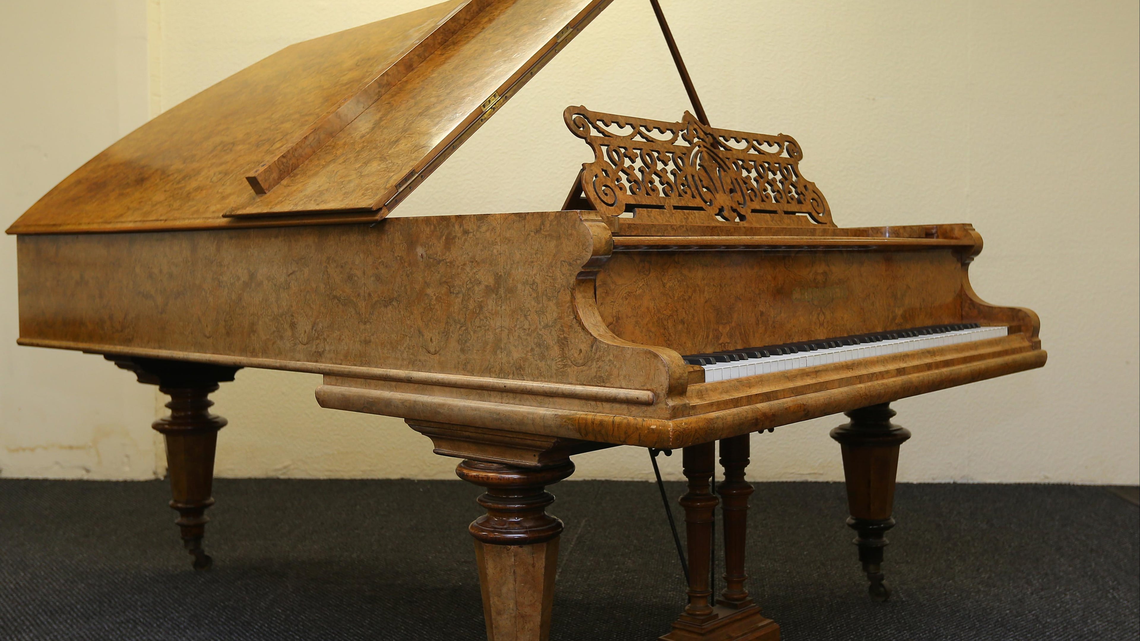 A Bechstein piano used by John Lennon and Paul McCartney, while filming their movie "Help!" in 1965. A MInnesota fourth-grader played Lennon's "Imagine" at a school talent show last week.