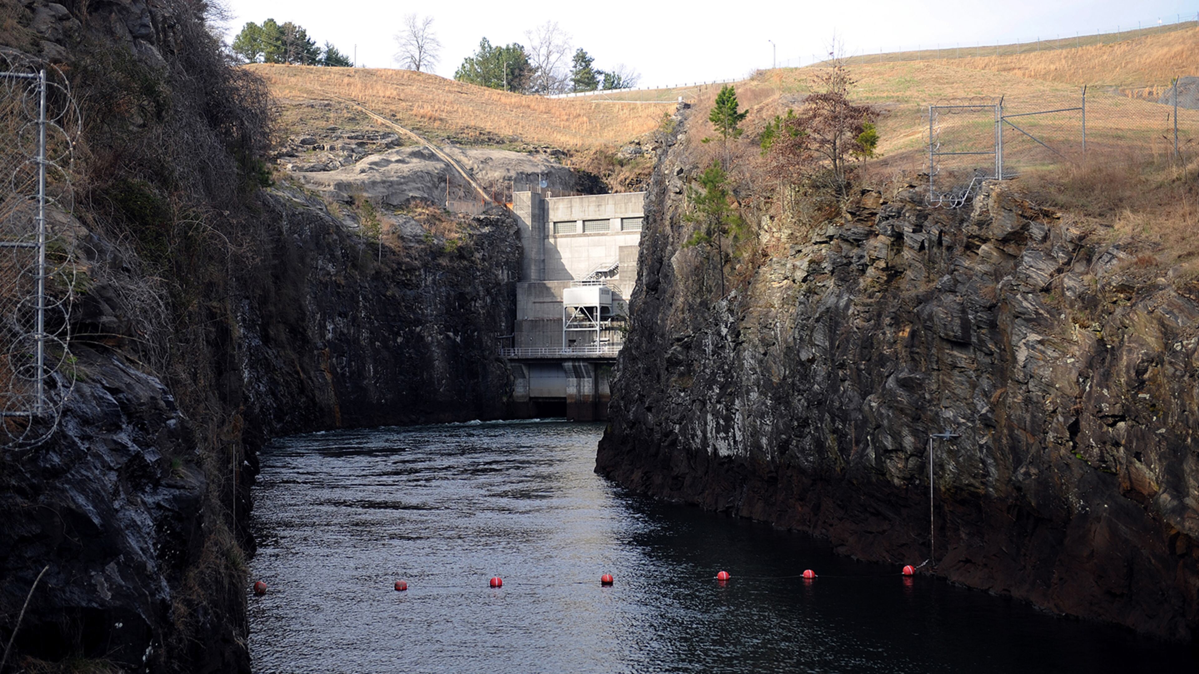 The Chattachoochee River, seen here in 2011, exits the Buford Dam powerhouse in Cumming. Lake Lanier is on the other side. (Bita Honarvar / AJC file)