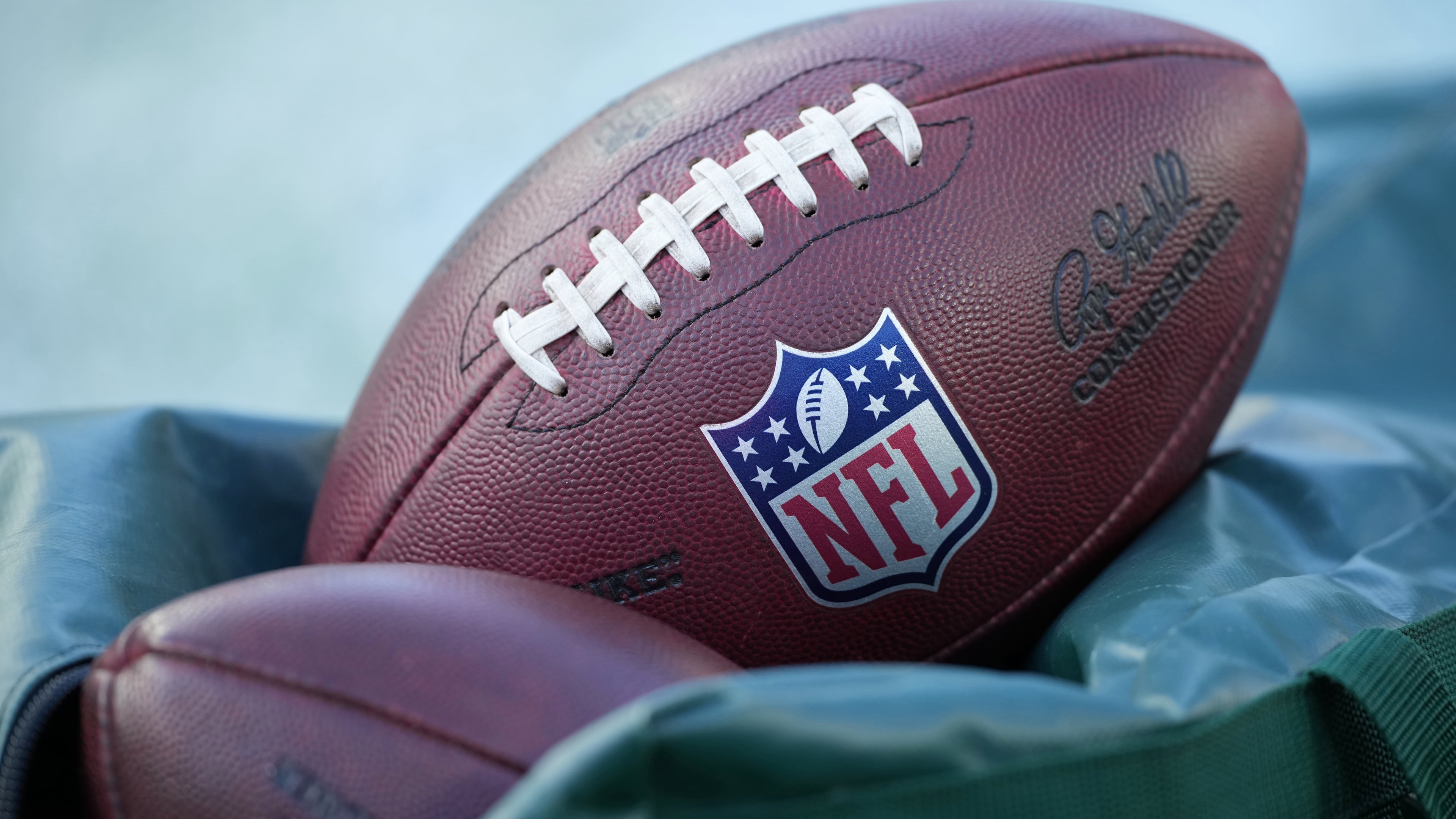 FILE - Footballs are seen before an NFL football game between the Philadelphia Eagles and the Washington Commanders on Jan. 4, 2026, in Philadelphia. (AP Photo/Matt Slocum, File)