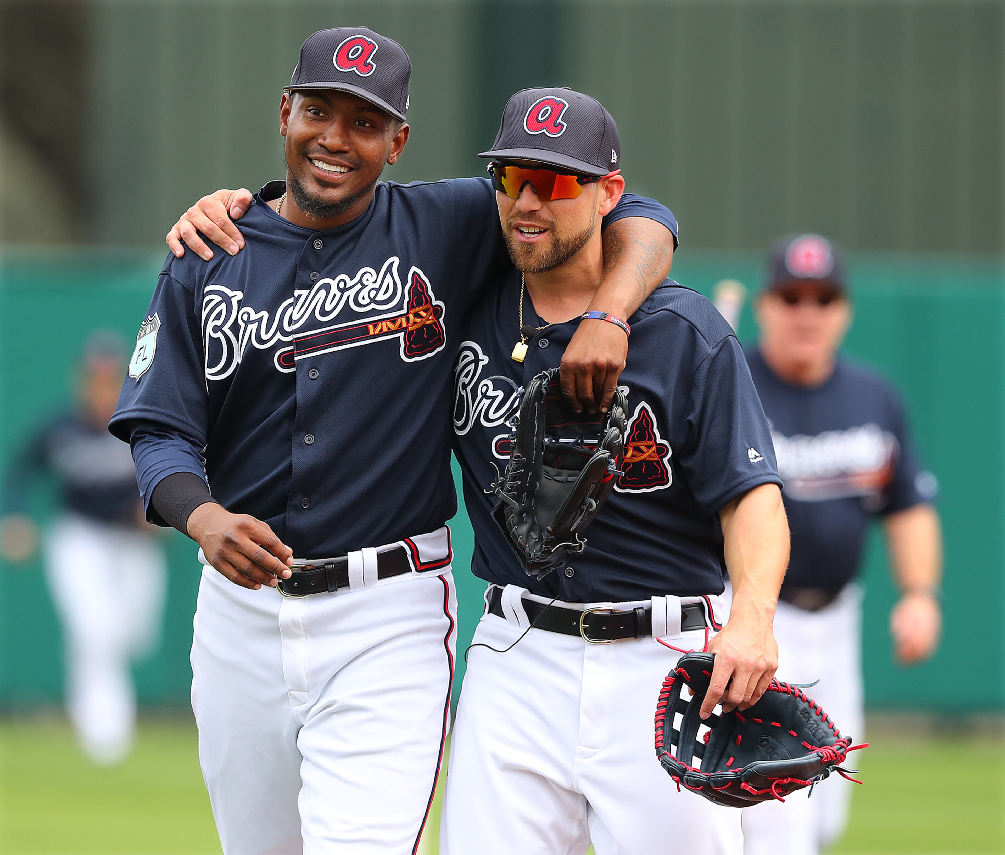 February 18, 2017, Lake Buena Vista, FL: Braves pitcher Julio Teheran and outfielder Ender Inciarte share a hug during the first full squad workout at Champion Stadium on Saturday Feb. 18, 2017, at the ESPN Wide World of Sports in Lake Buena Vista. Curtis Compton/ccompton@ajc.com