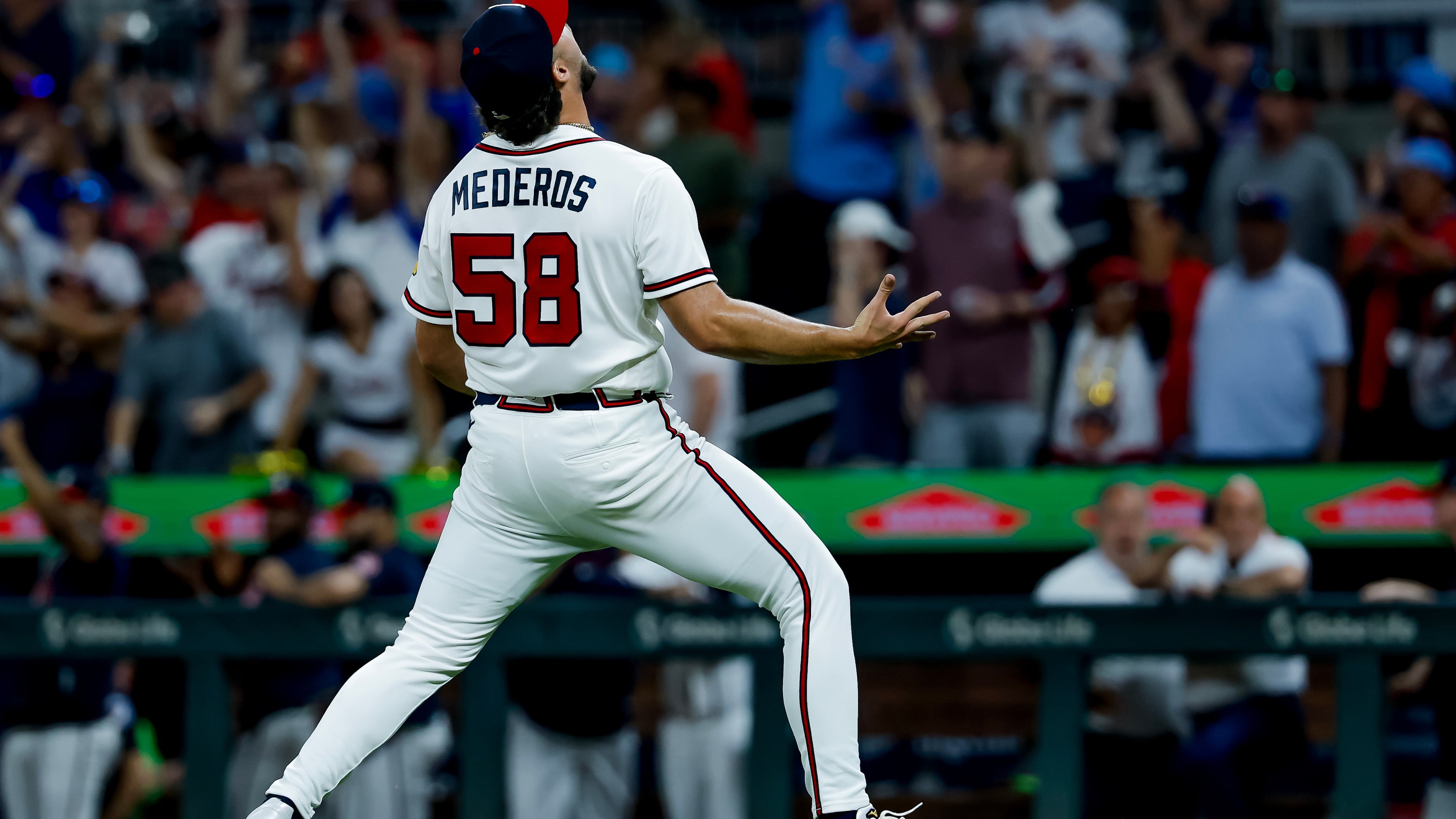 Atlanta Braves pitcher Victor Mederos reacts after defeating the San Diego Padres during the ninth inning of a baseball game, Monday, July 20, 2026, in Atlanta. (AP Photo/Erik S. Lesser)