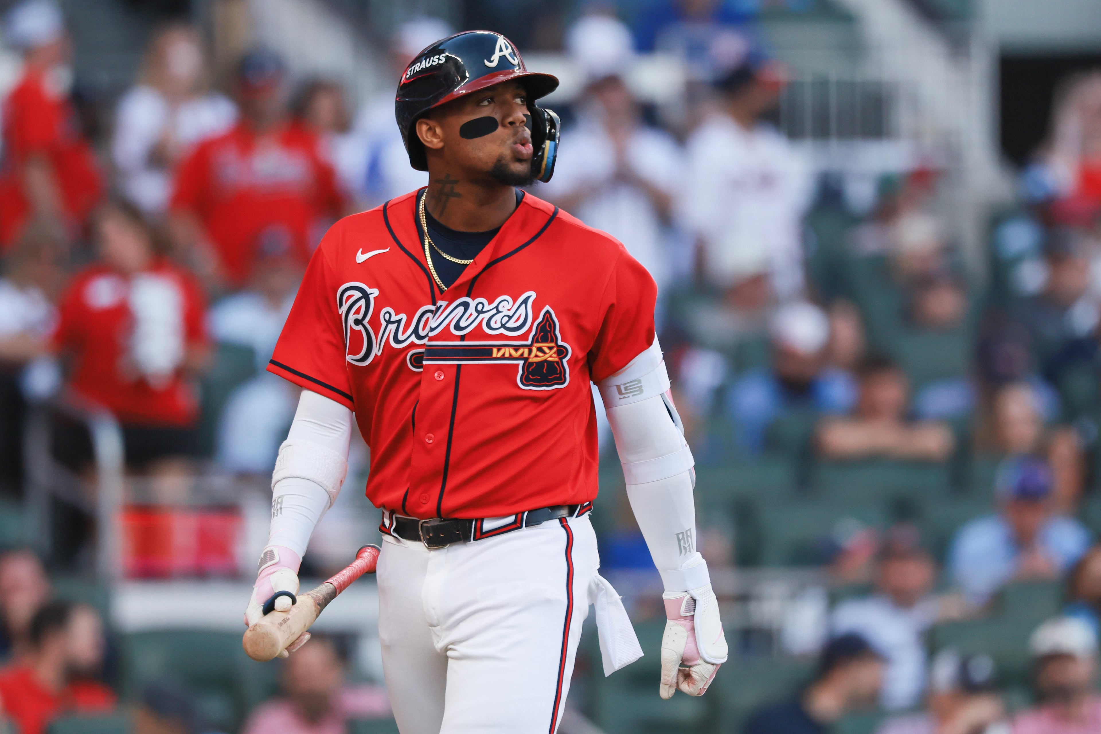 Atlanta Braves designated hitter Ronald Acua Jr. (13) reacts after striking out on an ABS challenge during the first inning of Game 3 of the MLB National League Division Series between the Atlanta Braves and the Los Angeles Dodgers, Tuesday, Oct. 6, 2026, in Atlanta. (Jason Getz/AJC)