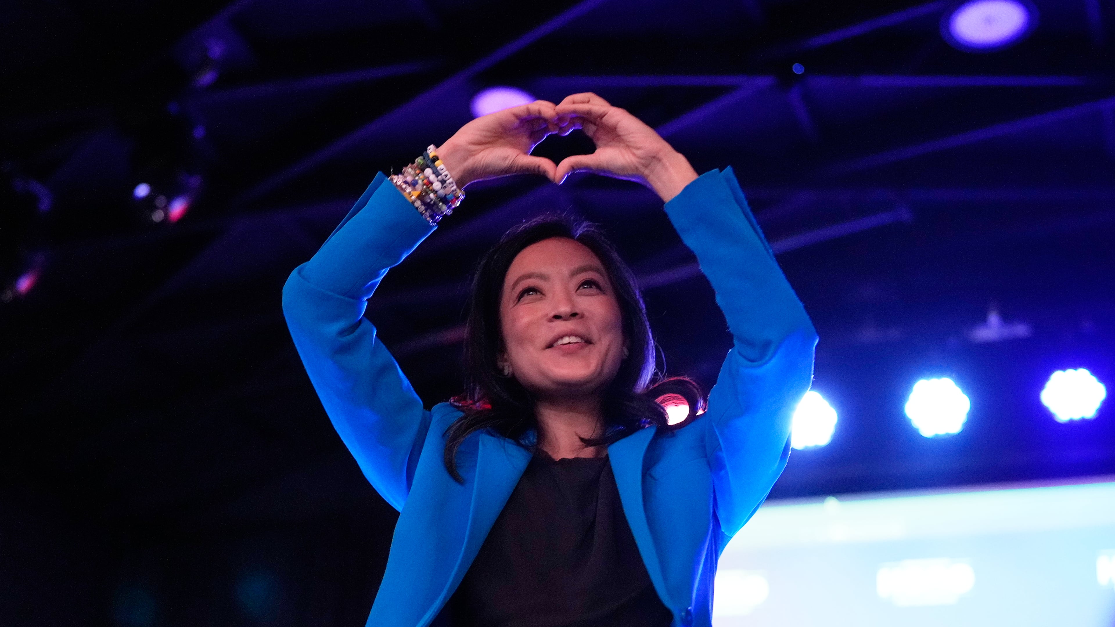 Democratic gubernatorial candidate Francesca Hong makes a heart gesture to supporters after speaking during a primary election night watch party Tuesday, Aug. 11, 2026, in Madison, Wis. (AP Photo/Nam Y. Huh)