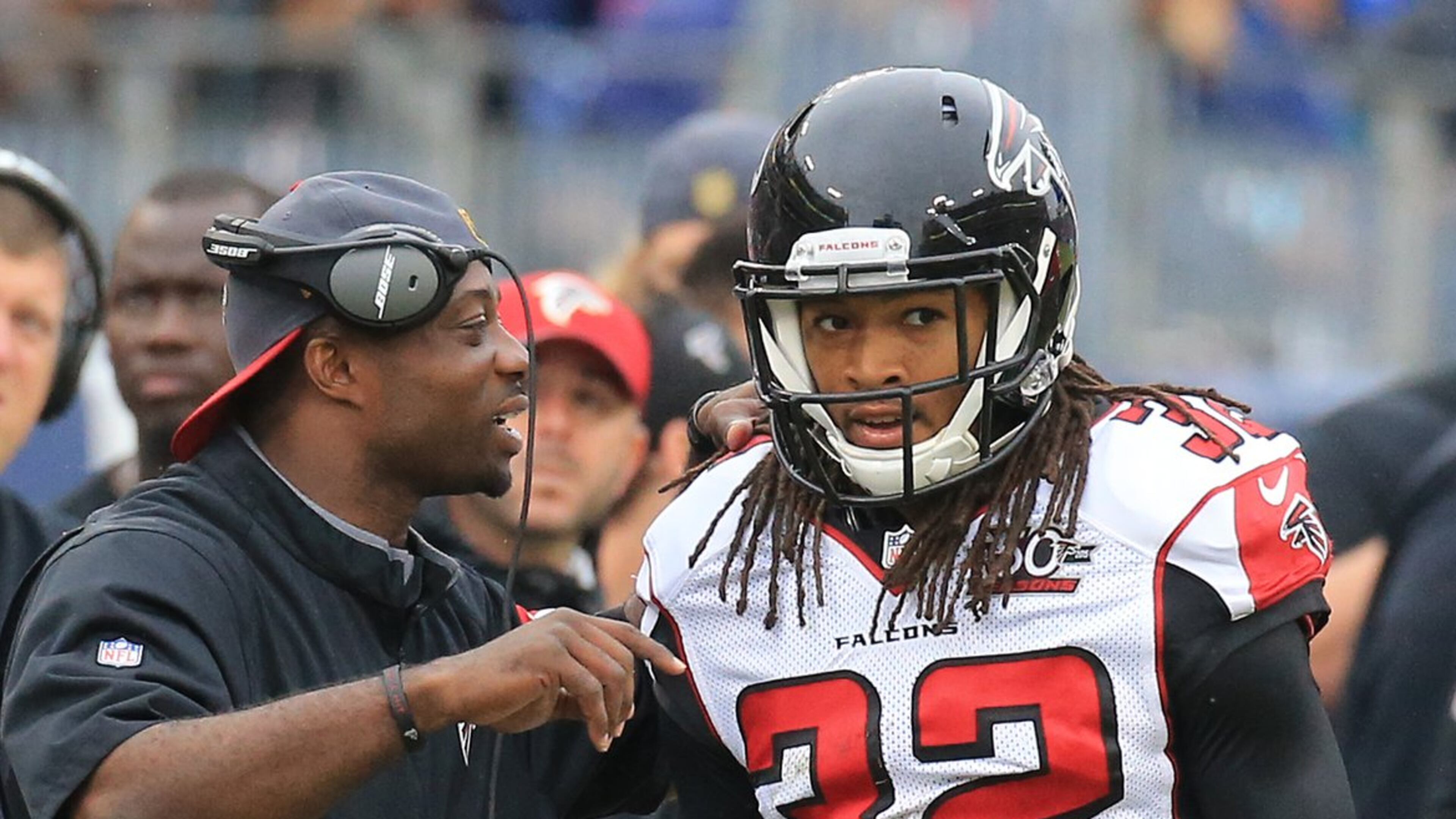 Falcons cornerback Jalen Collins gets coached up on the sidelines between plays against the Titans in a football game on Sunday, Oct. 25, 2015, in Nashville. Curtis Compton / ccompton@ajc.com