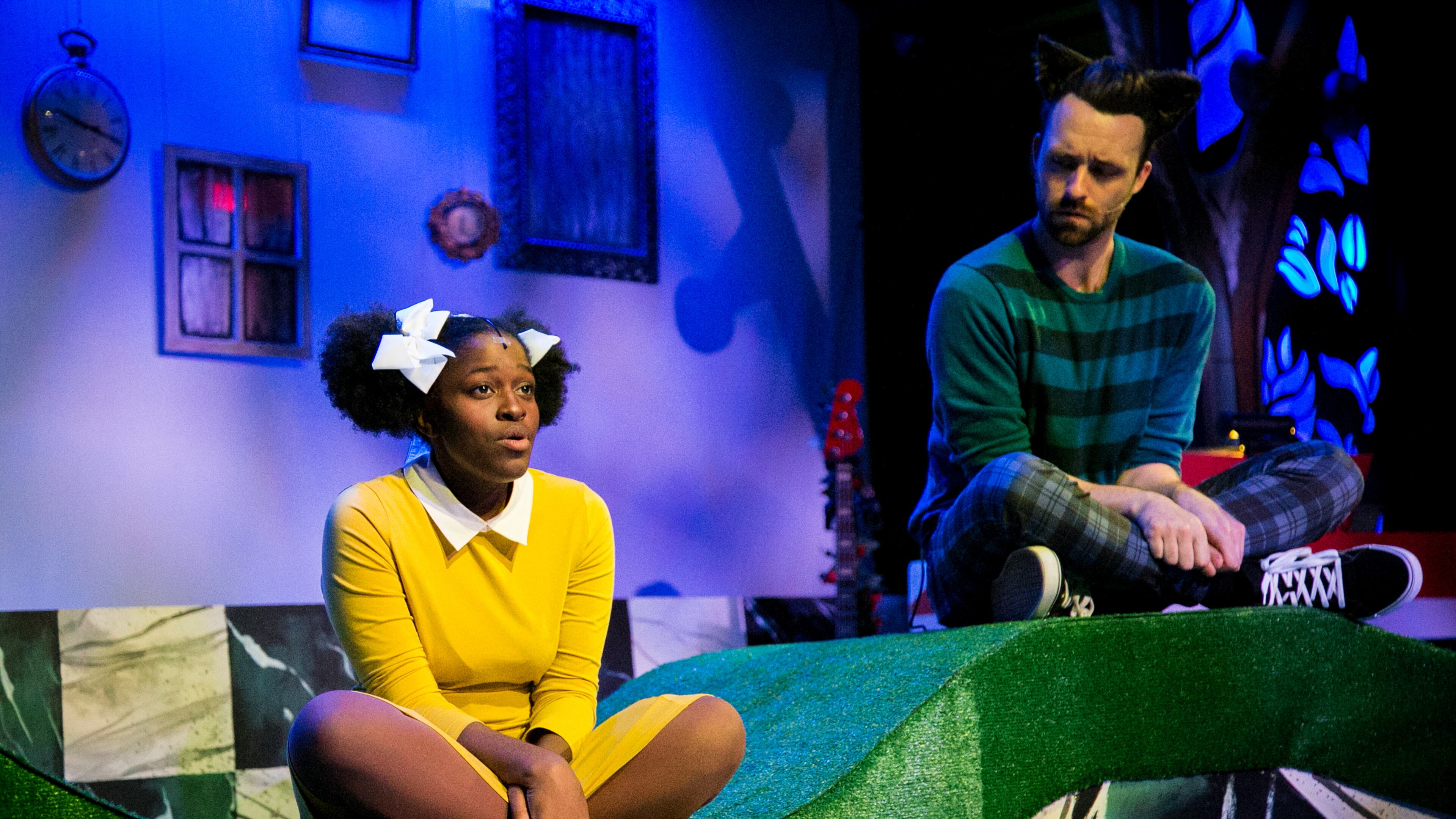 Ja'Siah Young as Alice and Danny Crowe as the Cheshire Cat in 'Wonderland."