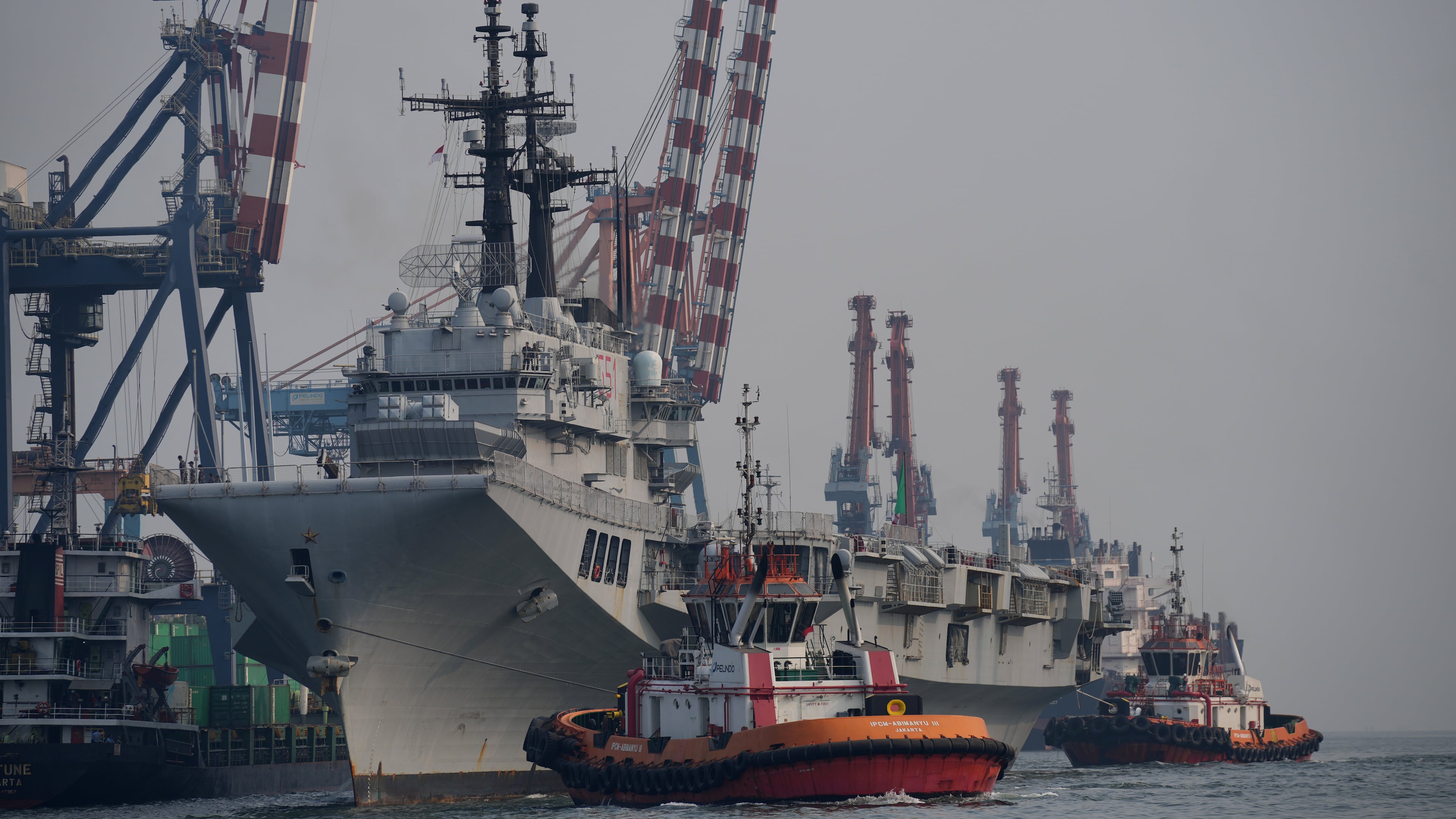 The Giuseppe Garibaldi, a former Italian Navy aircraft carrier, arrives at Tanjung Priok port in Jakarta, Indonesia, Friday, Sept. 18, 2026. (AP Photo/Tatan Syuflana)