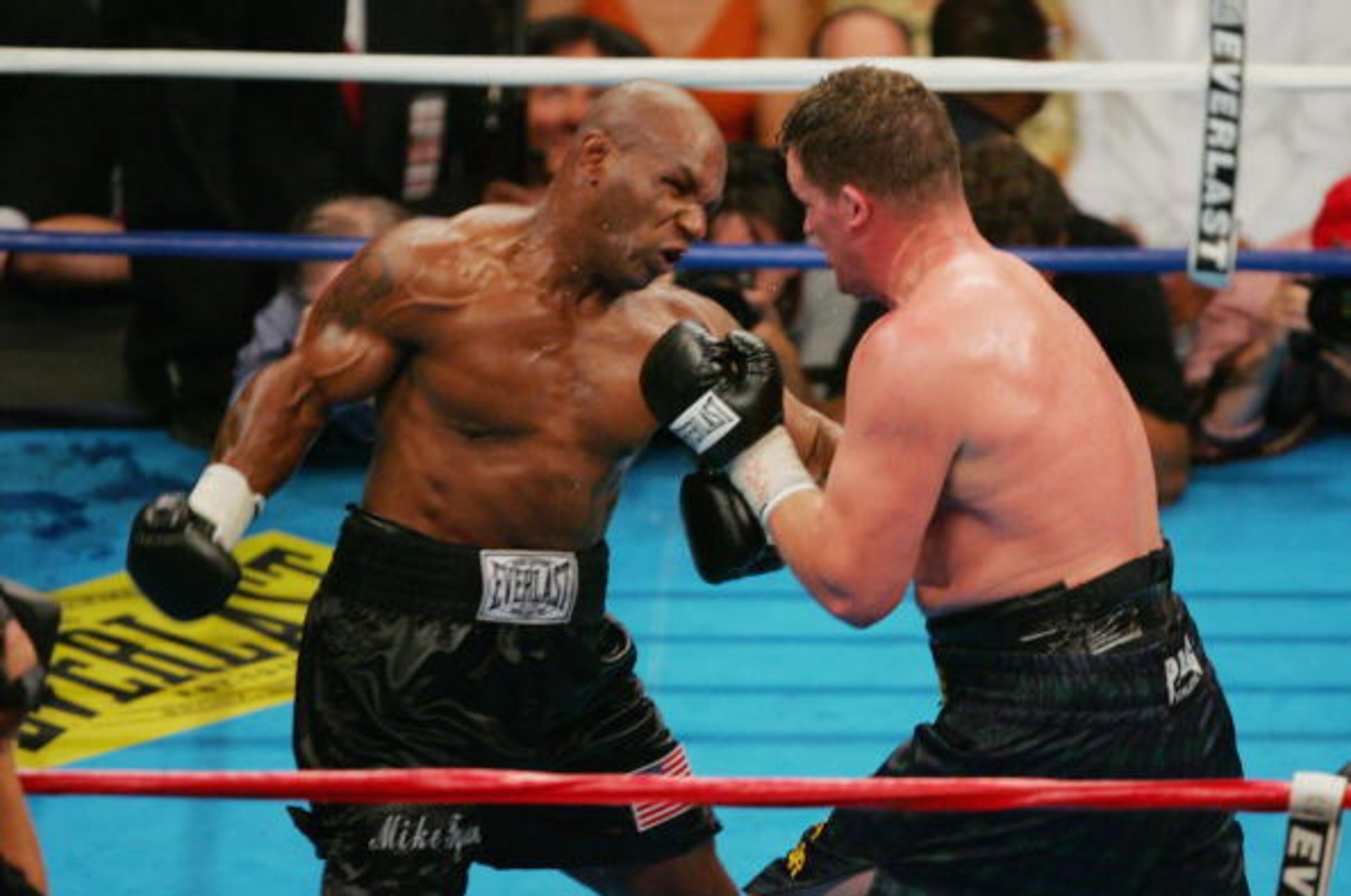 WASHINGTON - JUNE 11: Mike Tyson throws a punch at Kevin McBride during their heavyweight bout on June 11, 2005 at the MCI Center in Washington, DC. McBride was declared winner when Tyson quit after the sixth round. (Photo By Jamie Squire/Getty Images)