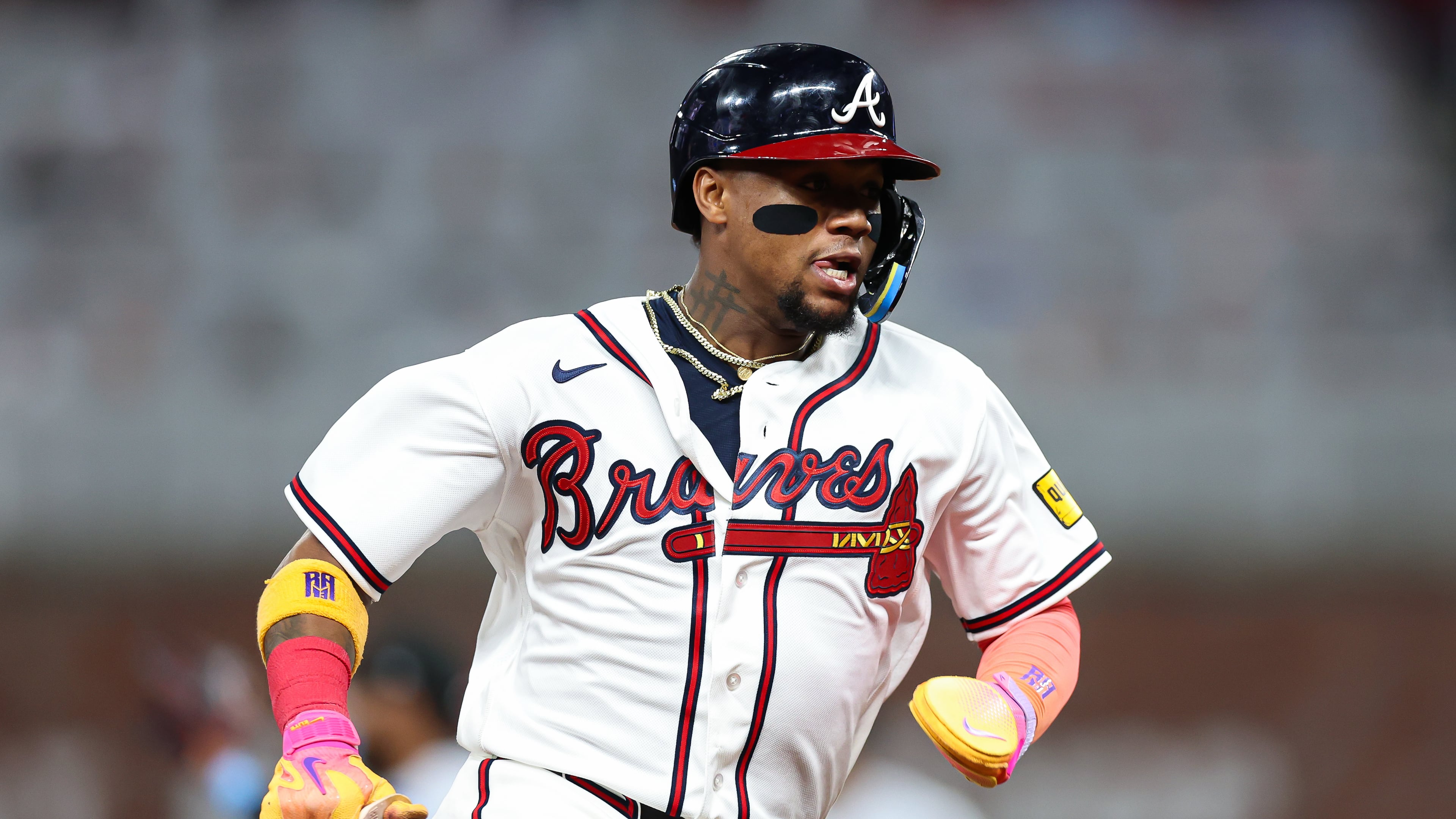 Atlanta Braves' Ronald Acuña Jr. runs to third base in the fifth inning of a baseball game against the Miami Marlins, Wednesday, April 15, 2026, in Atlanta. (AP Photo/Colin Hubbard)