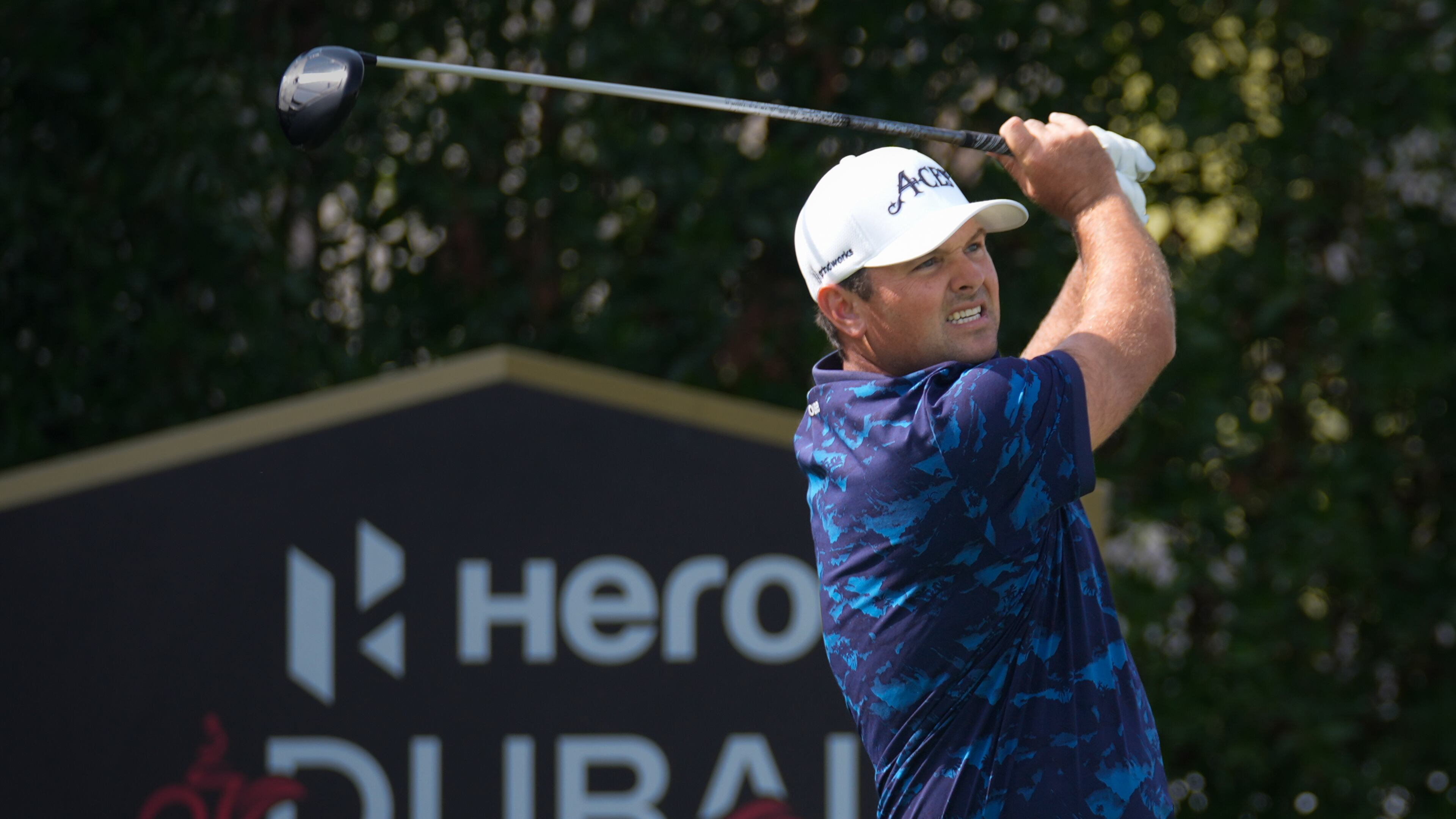 Patrick Reed of the United States tees off at 2nd hole during the third round of the Dubai Desert Classic in United Arab Emirates, Saturday, Jan. 24, 2026. (AP Photo/Altaf Qadri)