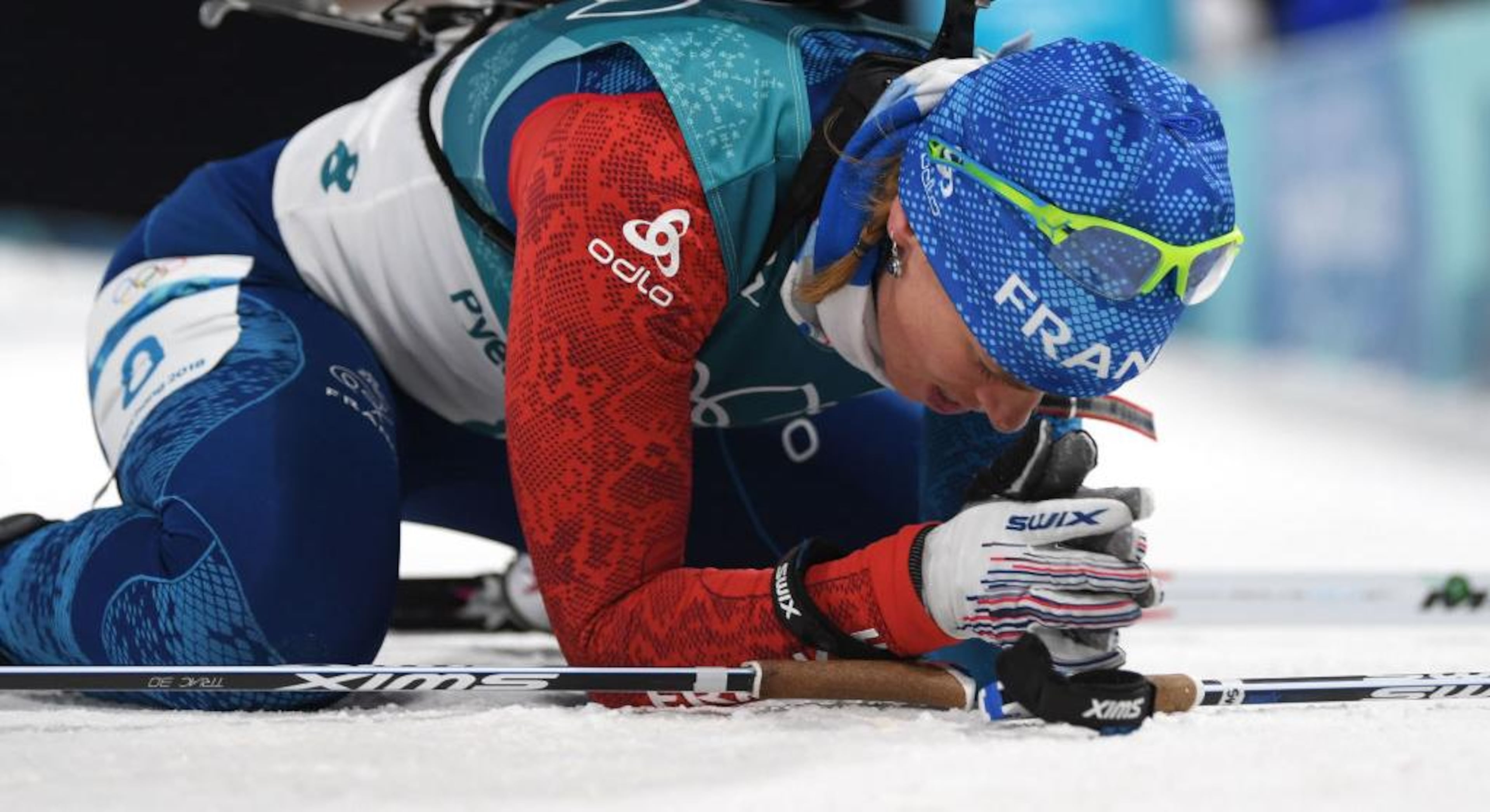 PYEONGCHANG-GUN, SOUTH KOREA - FEBRUARY 10: Anais Bescond of France falls to the snow during the Women's Biathlon 7.5km Sprint on day one of the PyeongChang 2018 Winter Olympic Games at Alpensia Biathlon Centre on February 10, 2018 in Pyeongchang-gun, South Korea. (Photo by Matthias Hangst/Getty Images)