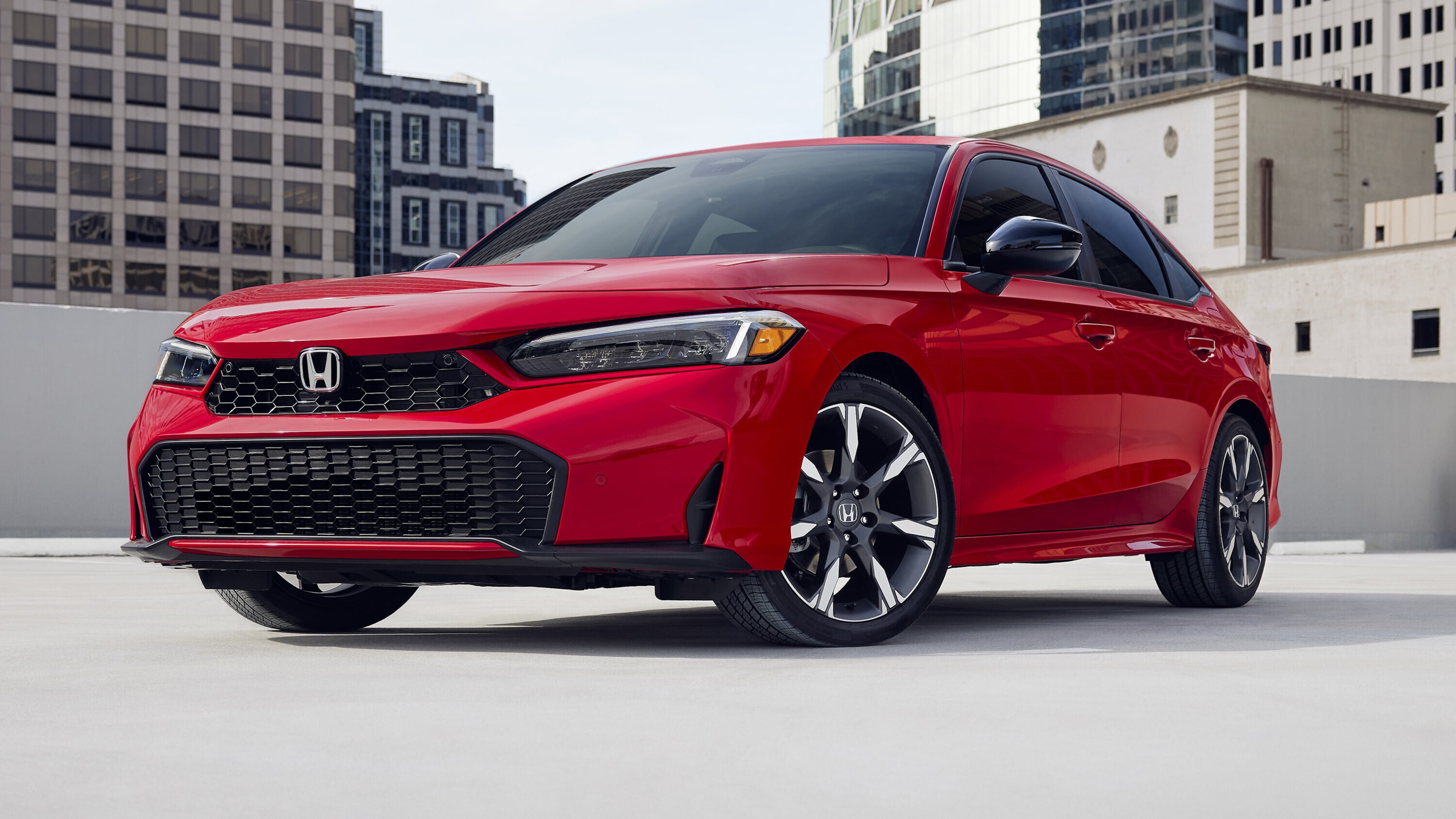 This photo provided by Honda shows the 2026 Civic sedan, an affordable and highly rated compact car. (Courtesy of American Honda Motor Co. via AP)