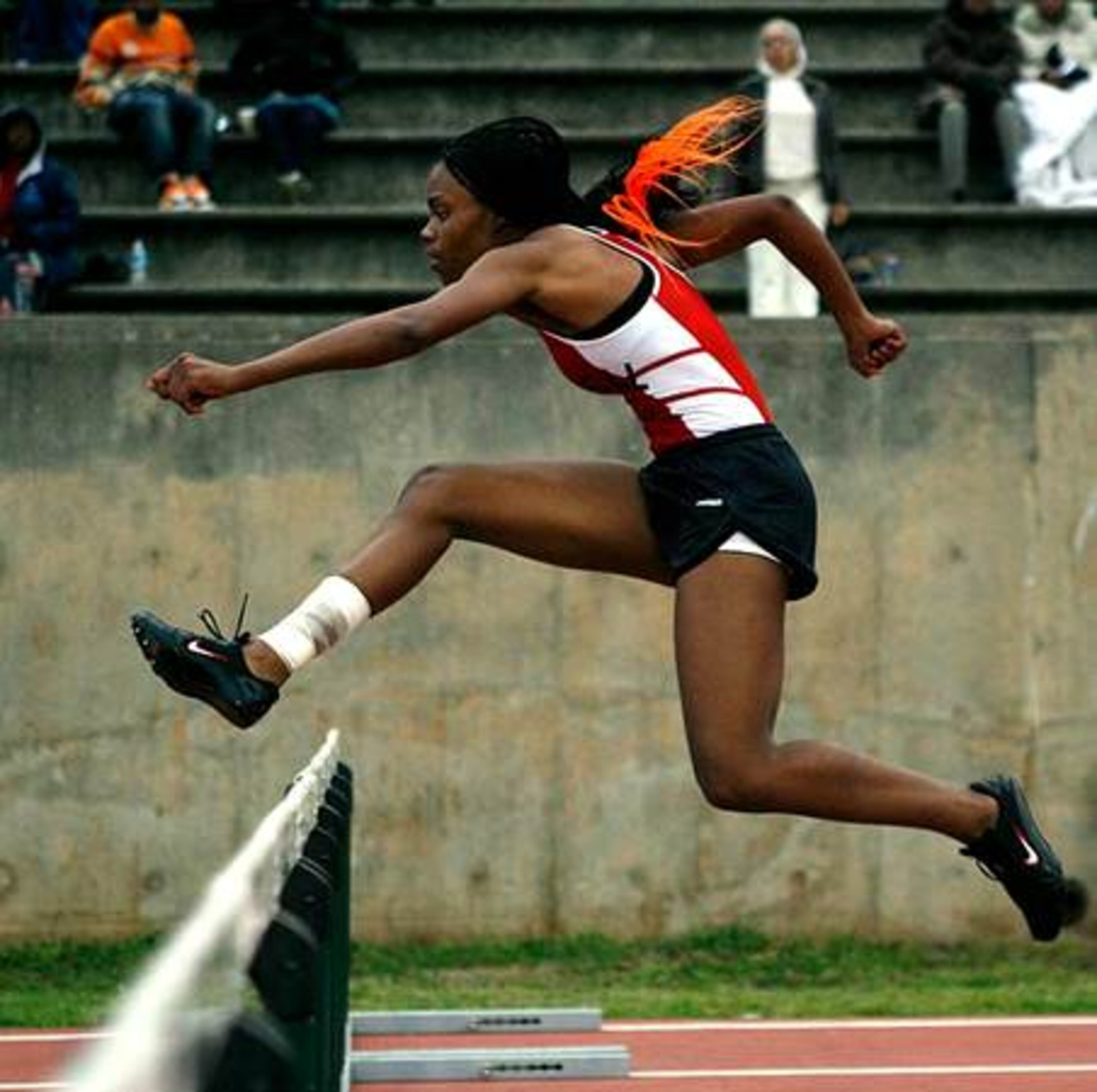 Therrell's Santeria Moses takes the lead in the Girls' 300 Meter Hurdles.