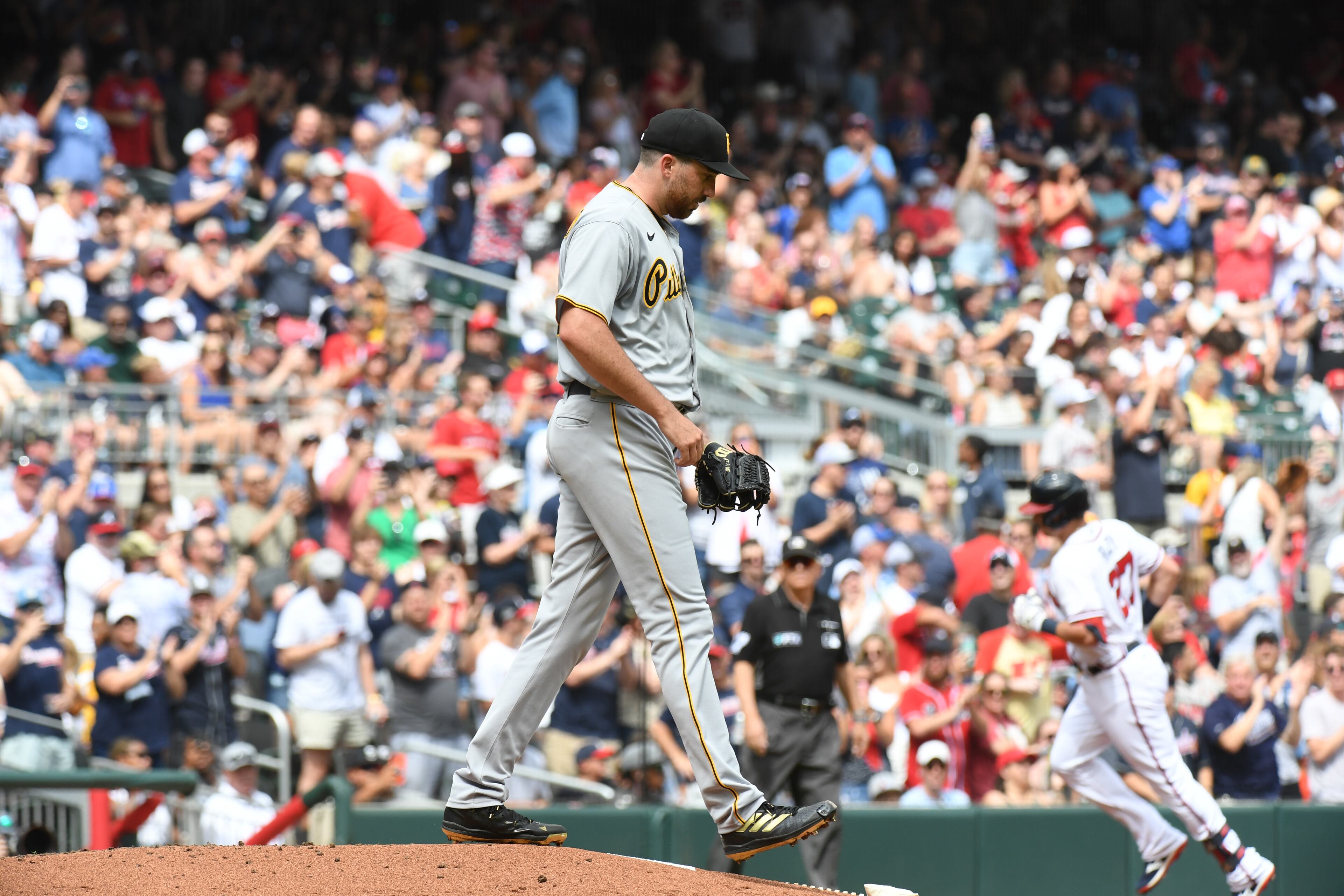June 11, 2022 Atlanta - Pittsburgh Pirates' pitcher Zach Thompson (39) reacts after allowing a solo home run by Atlanta Braves' third baseman Austin Riley in the first inning at Truist Park on Saturday, June 11, 2022. (Hyosub Shin / Hyosub.Shin@ajc.com)