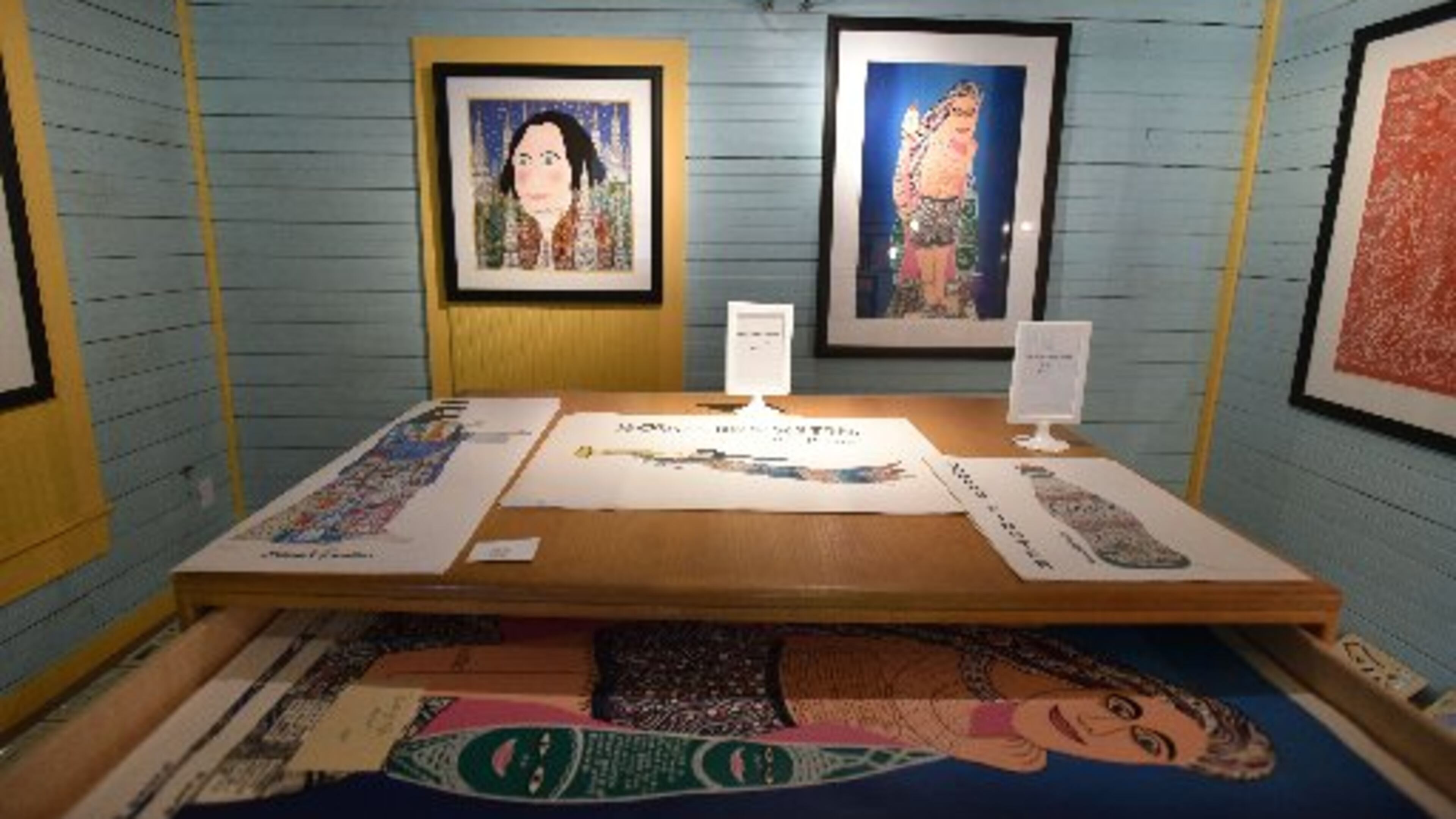 Framed and loose prints are among items stocked in the shop in the new Visitors Center at folk artist Howard Finster's Paradise Garden. HYOSUB SHIN / HSHIN@AJC.COM