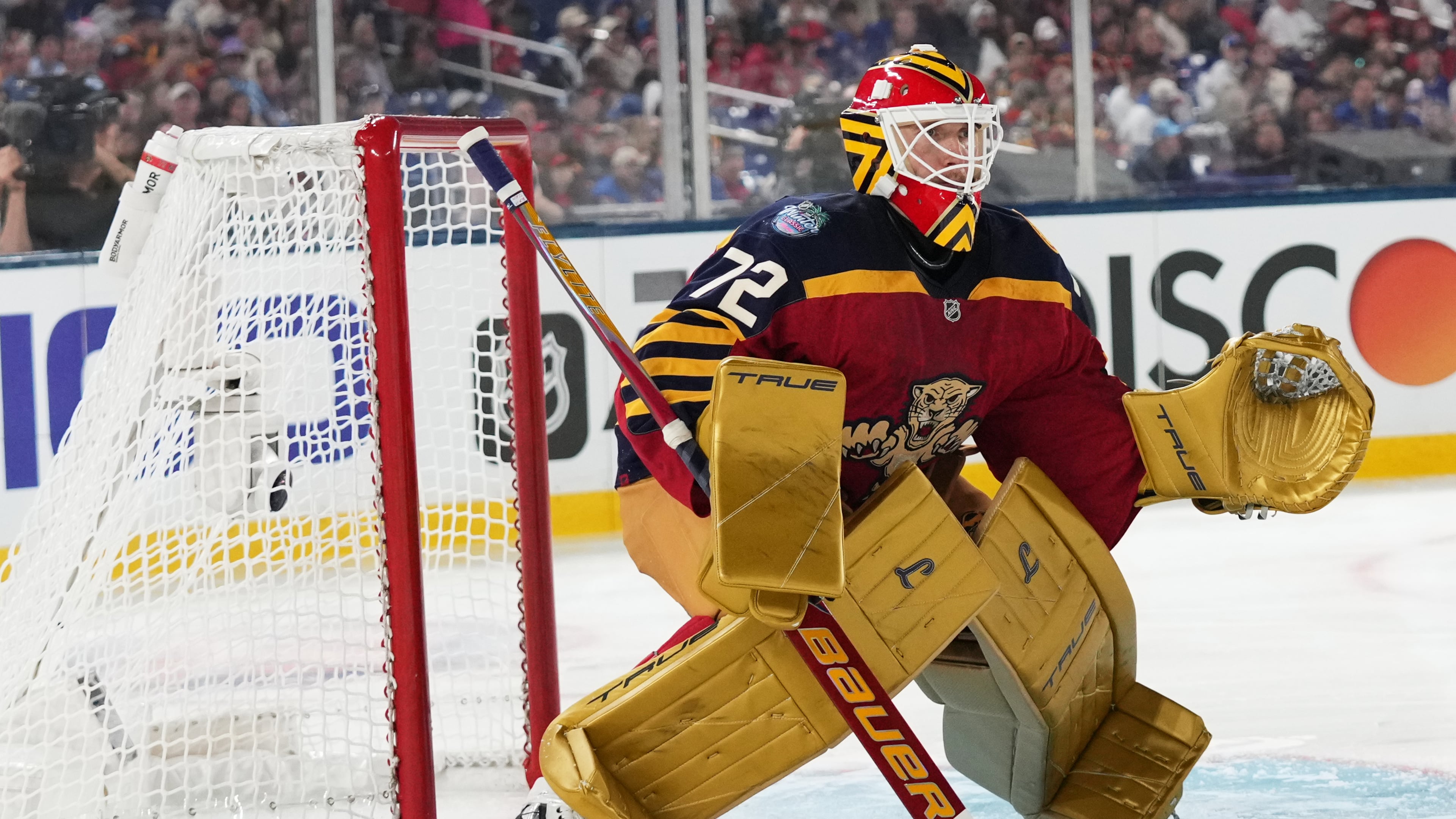 FILE - Florida Panthers goaltender Sergei Bobrovsky defends the goal during the second period of the NHL Winter Classic outdoor hockey game against the New York Rangers Jan. 2, 2026, in Miami. (AP Photo/Lynne Sladky, File)