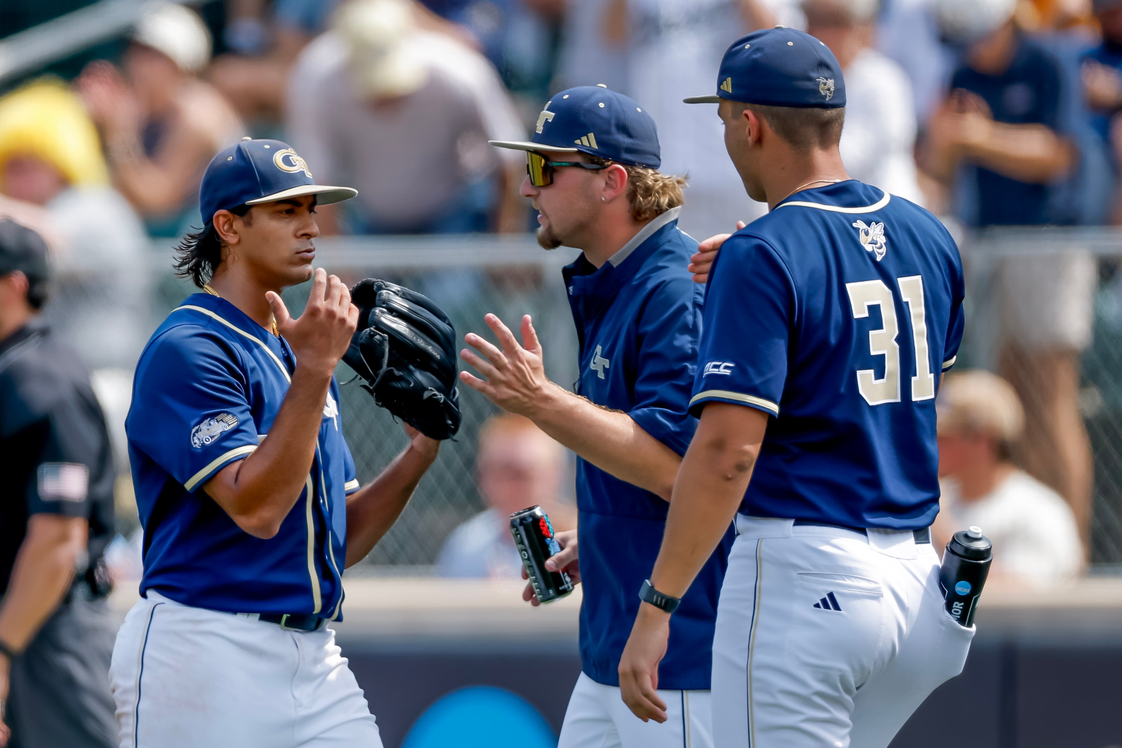 Georgia Tech pitcher Mason Patel (left) is greeted after pitching against Oklahoma during the second inning of the Atlanta Regional elimination baseball game at Russ Chandler Stadium, Monday, June 1, 2026, in Atlanta. (Erik S. Lesser for the AJC)