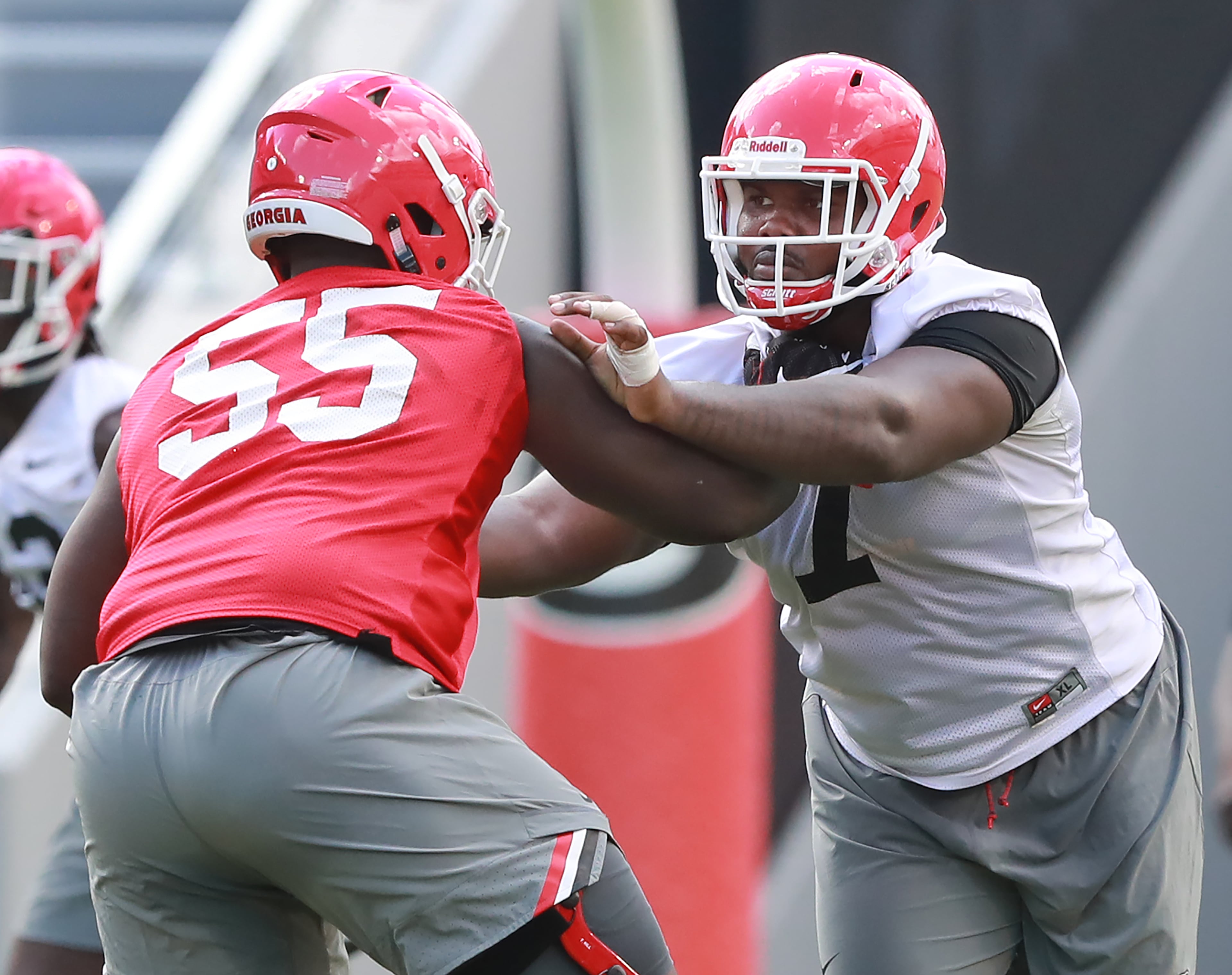 August 4, 2018 Athens: Georgia defensive lineman Jay Hayes (center) blocks offensive lineman Trey Hill during team practice at Fan Day on Saturday, August 4, 2018, in Athens. Curtis Compton/ccompton@ajc.com