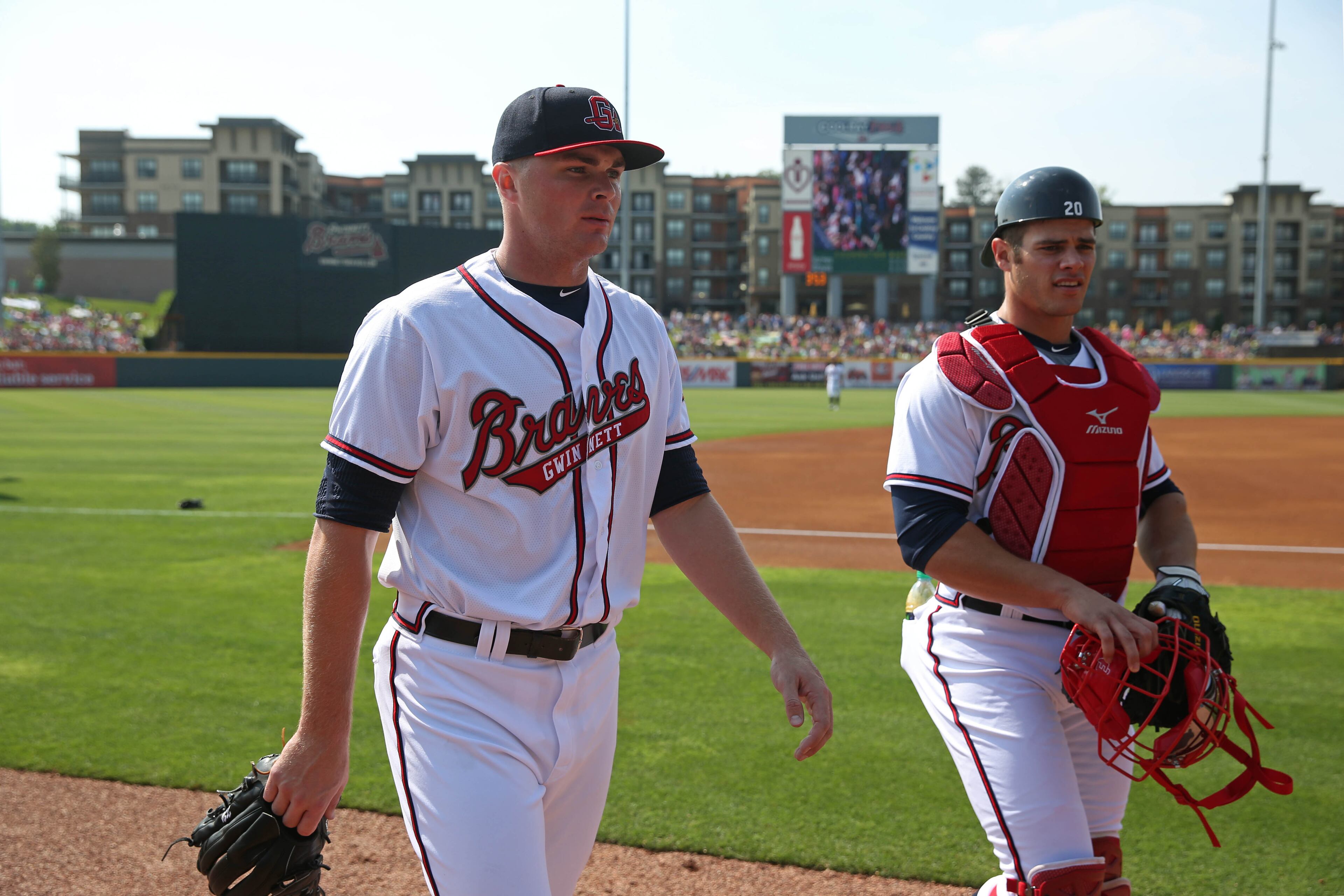 May 11, 2017 - Lawrenceville, Ga: Gwinnett Braves starting pitcher Sean Newcomb (15) walks with catcher Anthony Recker (20) before their game against the Toledo Mud Hens at Coolray Field Thursday, May 11, 2017, in Lawrenceville, Ga. PHOTO / JASON GETZ