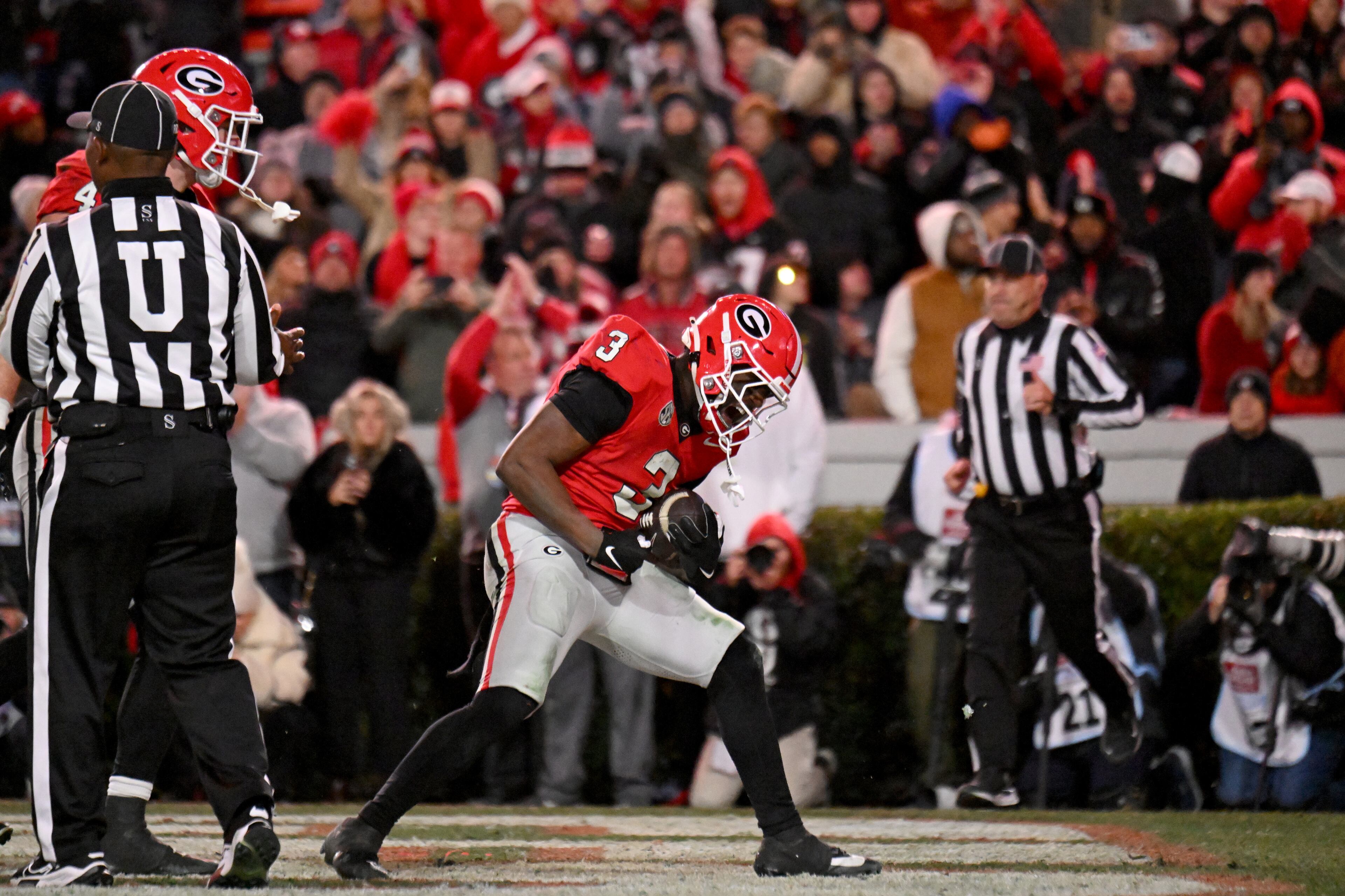 Georgia running back Nate Frazier (3) reacts after scoring a touchdown during the fourth quarter in an NCAA football game at Sanford Stadium, Friday, November 29, 2024, in Athens. Georgia won 44-42 in eight overtimes. (Hyosub Shin / AJC)