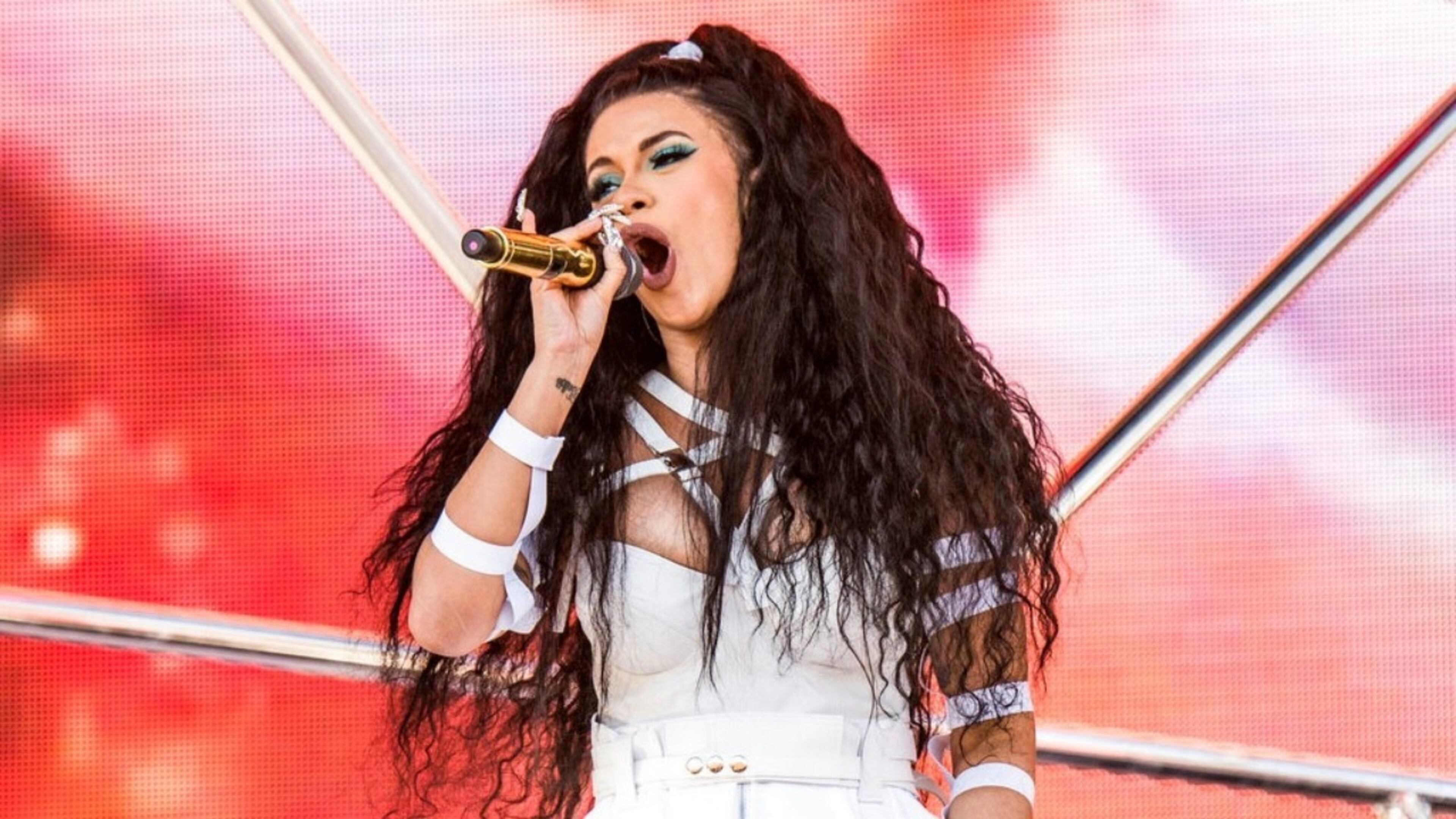 FILE- In this April 22, 2018 file photo, Cardi B performs at the Coachella Music & Arts Festival at the Empire Polo Club in Indio, Calif. Cardi B and Travis Scott are heading to the City of Brotherly Love to headline Jay-Z’s annual Made in America festival in Philadelphia on Aug. 31-Sept. 1 for Labor Day weekend.