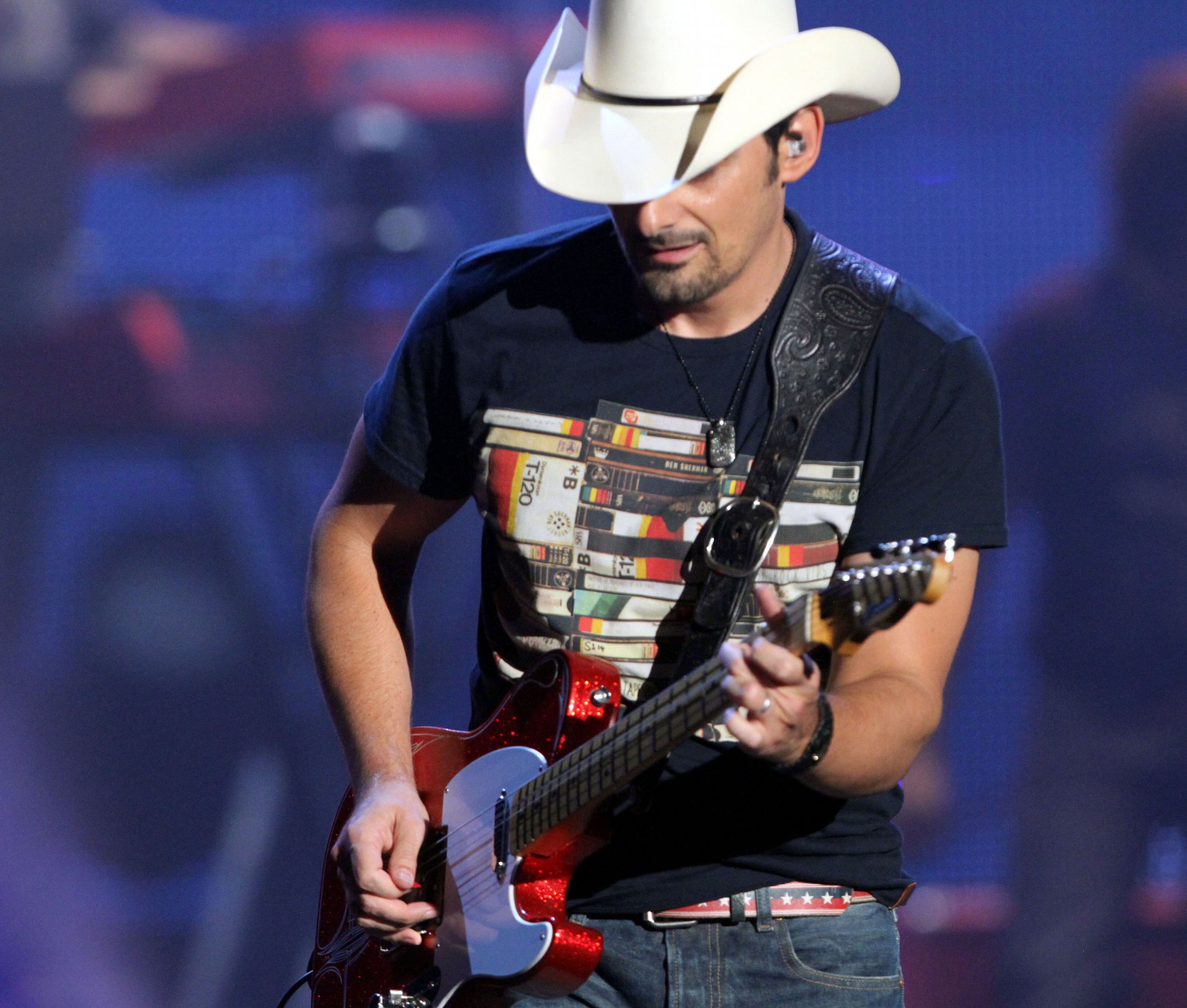 Country singer-songwriter-guitarist Brad Paisley brought his Country Nation world tour to Aaron's Amphitheatre at Lakewood in Atlanta Thursday, Aug. 14, 2014. Paisley has sold more than 12 million albums and won three Grammy Awards, 14 Academy of Country Music Awards, 14 Country Music Association Awards, two American Music Awards and has earned Country music's top honor, becoming a member of the Grand Ole Opry. (Robb D. Cohen/RobbsPhotos.com)