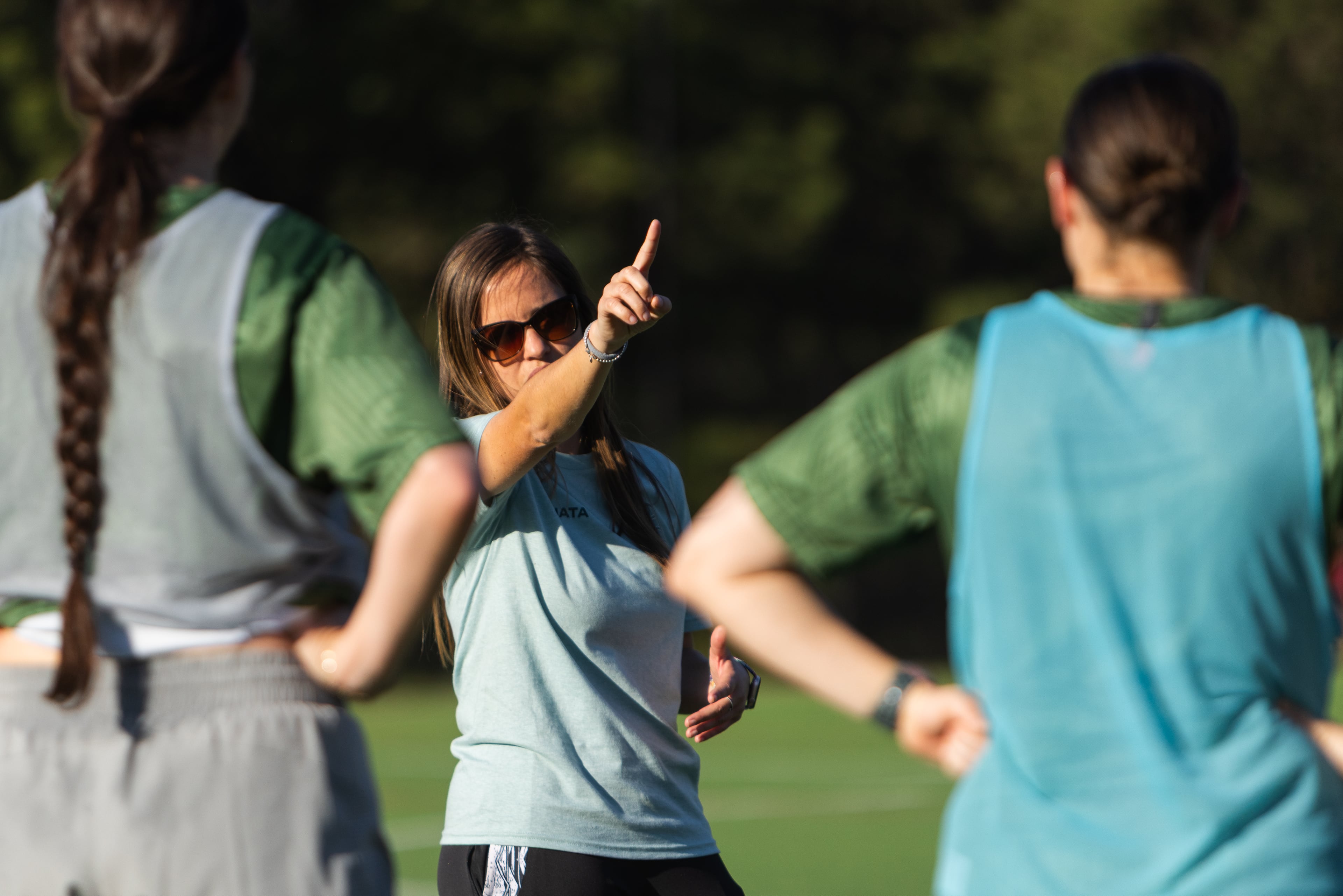 Head coach Renata Peixoto speaks during a recent Speedy Turtles practice.