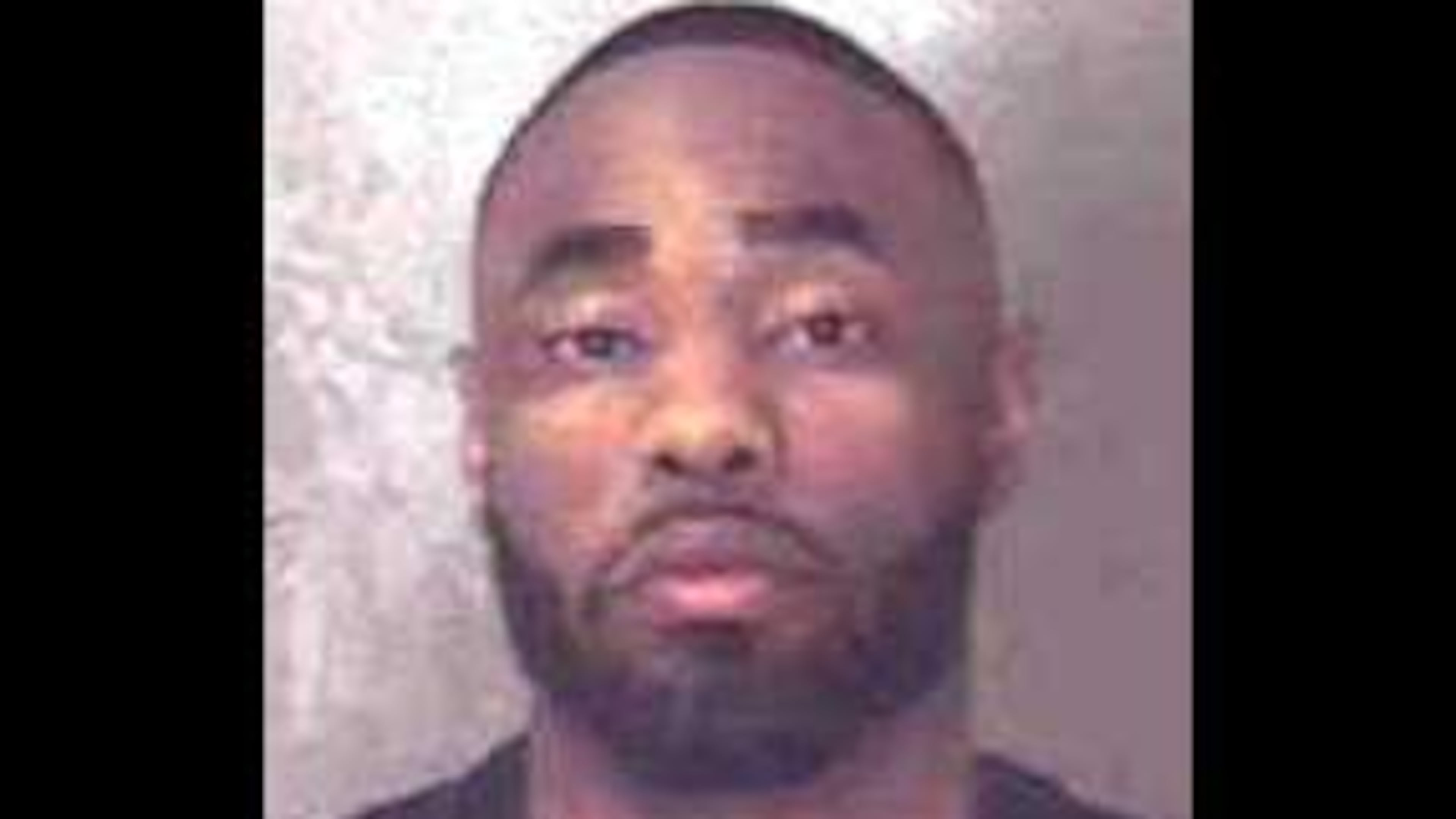 Ajamia Guyton, a now-former DeKalb County police officer, was fired for allegedly tampering with a crime scene.