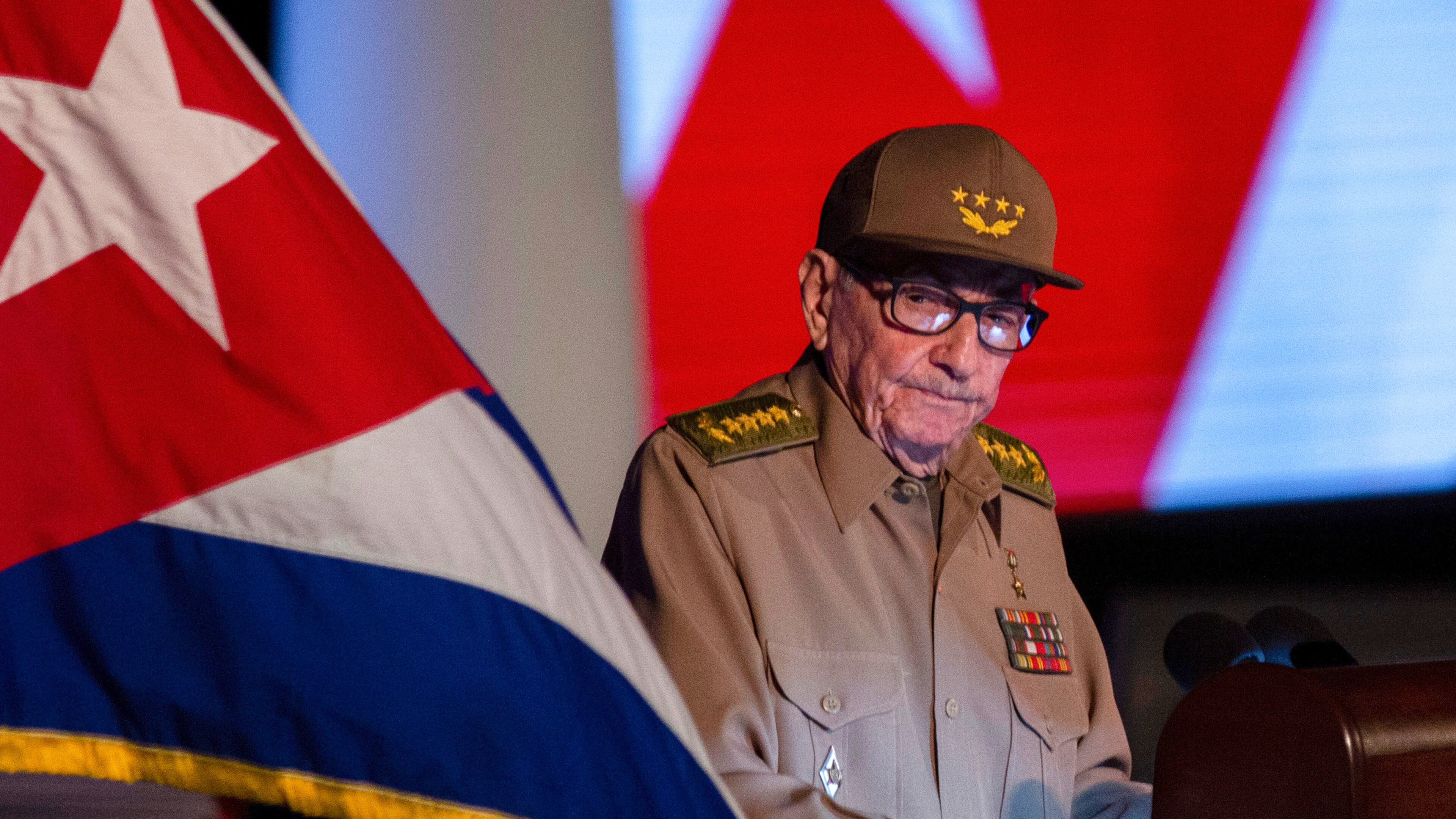 FILE - Former Cuban President Raul Castro looks at the Cuban flag during his speech at the event celebrating the 65th anniversary of the triumph of the revolution in Santiago, Cuba, Jan. 1, 2024. (AP Photo/Ismael Francisco, File)