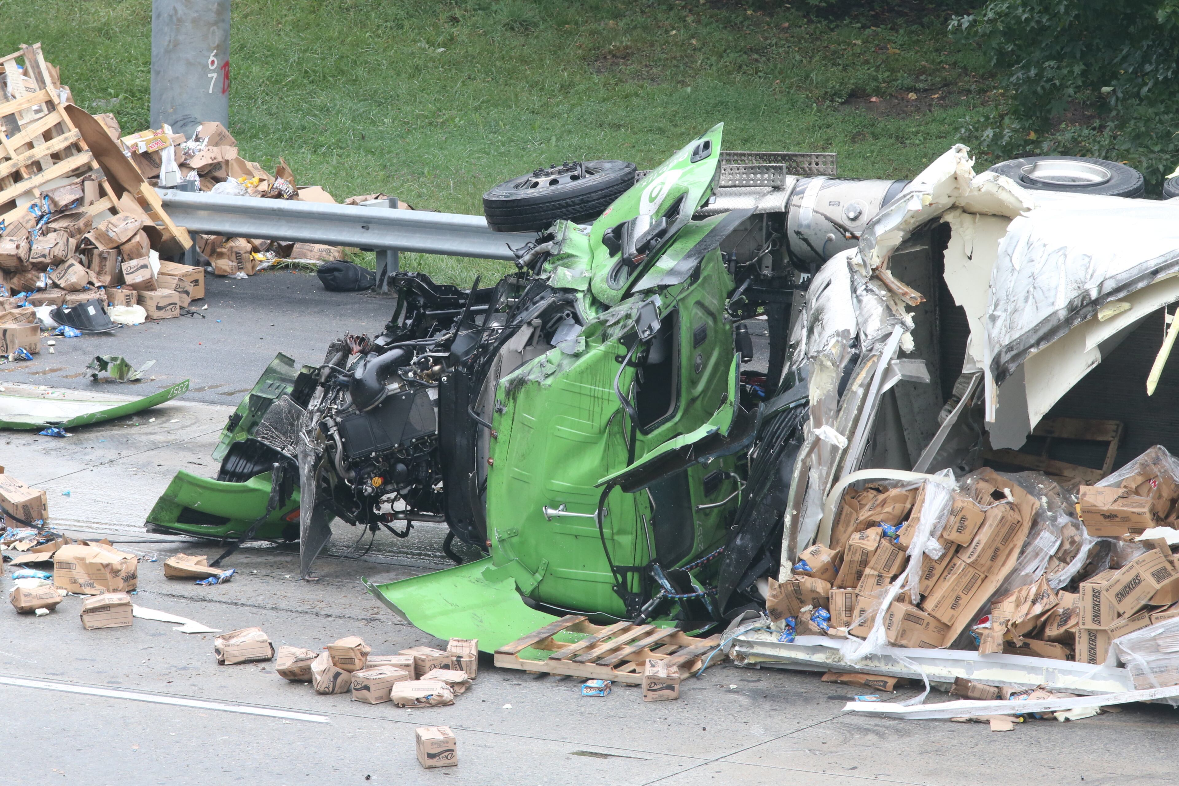 One of the busiest interchanges in the state began to re-open in time for the Friday afternoon rush hour. But delays were still heavy more than three hours after two tractor-trailers plunged from I-285 and landed on Ga. 400.