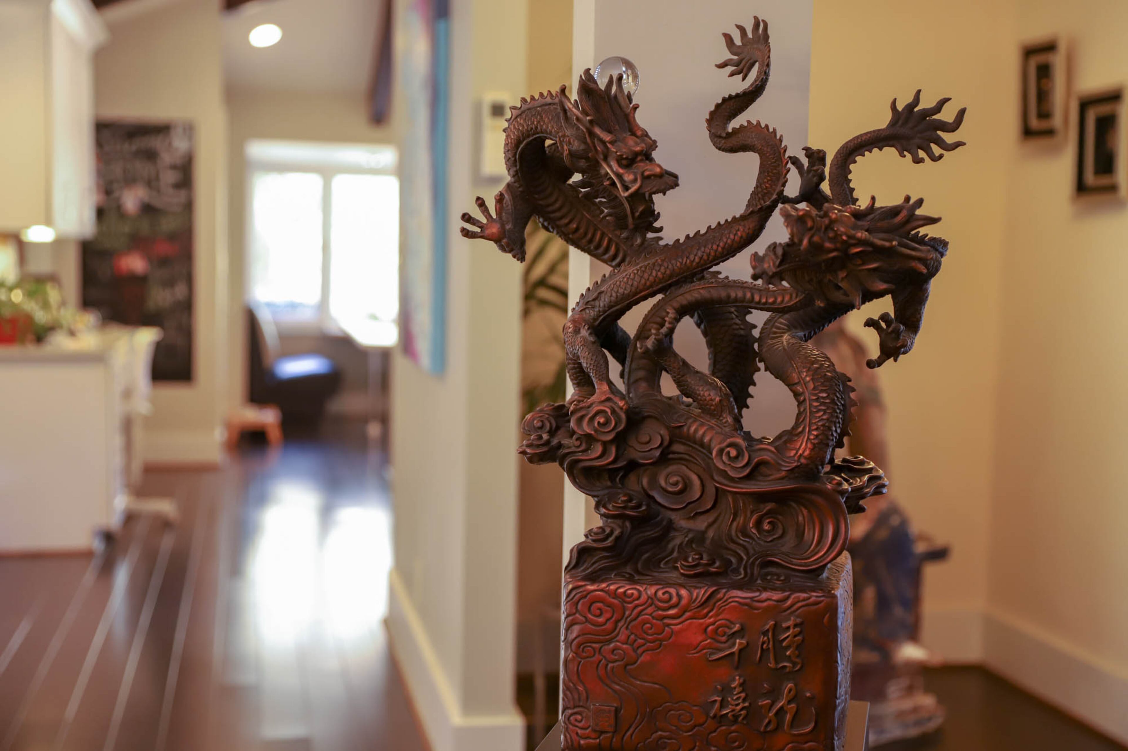 The Rosenhafts' collection of Asian-inspired art includes many pieces collected during their early years of marriage, including this intertwined, double-headed dragon statue.