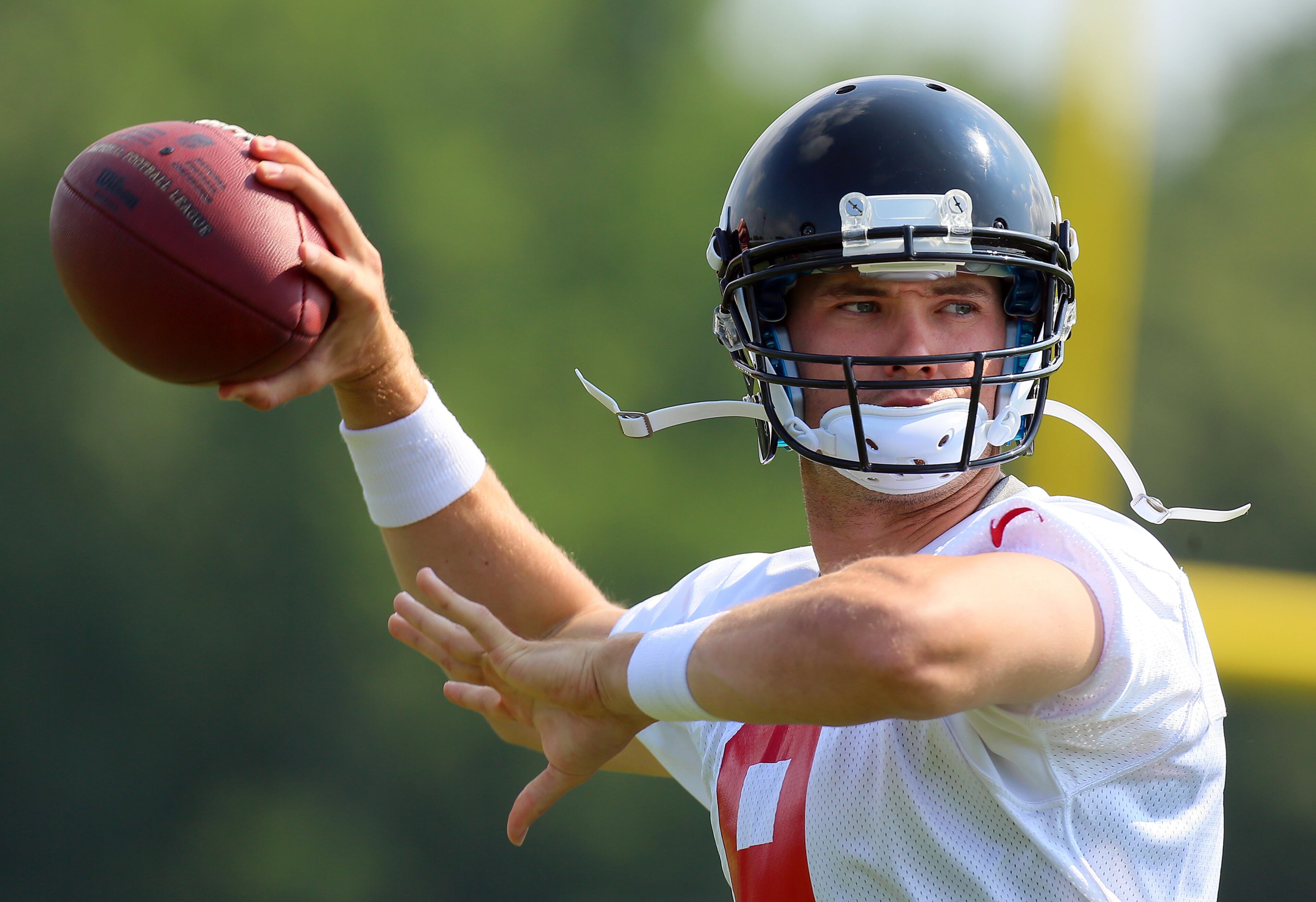 Falcons rookie quarterback Seth Doege, Texas Tech, throws a pass during practice. CURTIS COMPTON / CCOMPTON@AJC.COM