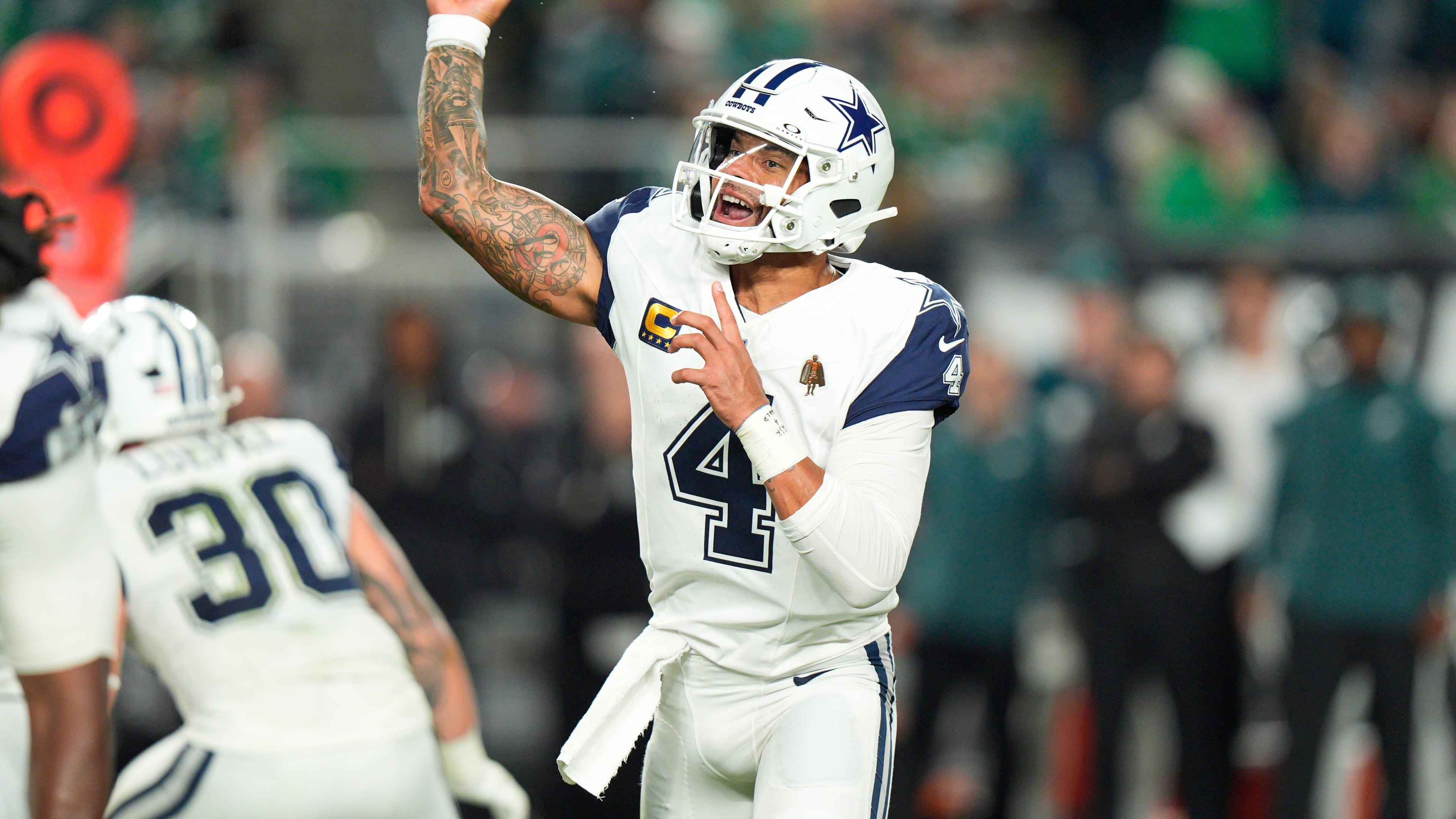 Dallas Cowboys quarterback Dak Prescott (4) throws during the second half of an NFL football game against the Philadelphia Eagles in Philadelphia, Monday, Oct. 26, 2026. (AP Photo/Chris Szagola)