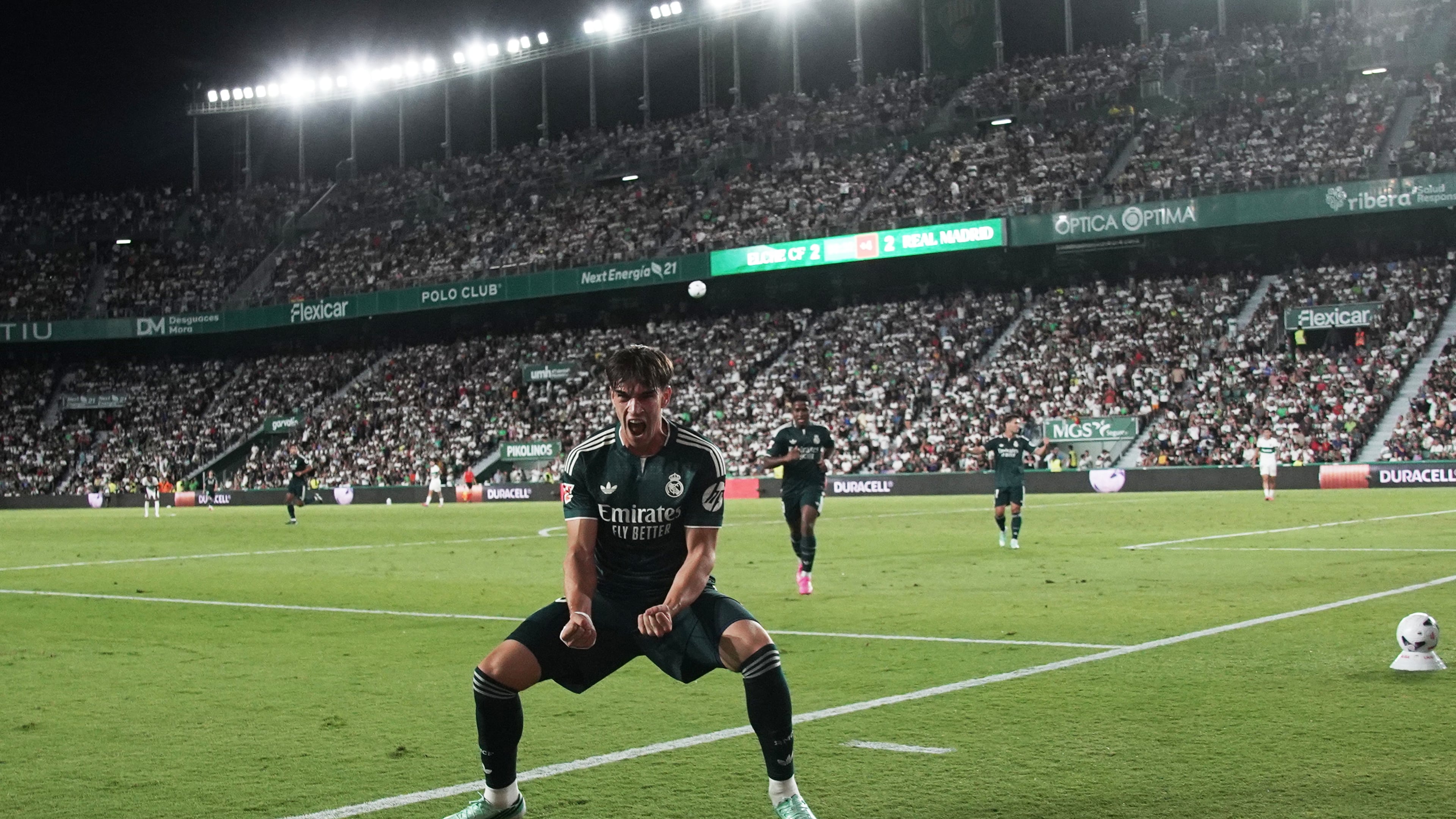 Real Madrid's Carlos Espi celebrates after scoring his sides third goal during the Spanish La Liga soccer match between Elche and Real Madrid in Elche, Spain, Tuesday, Sept. 15, 2026. (AP Photo/Alberto Saiz)