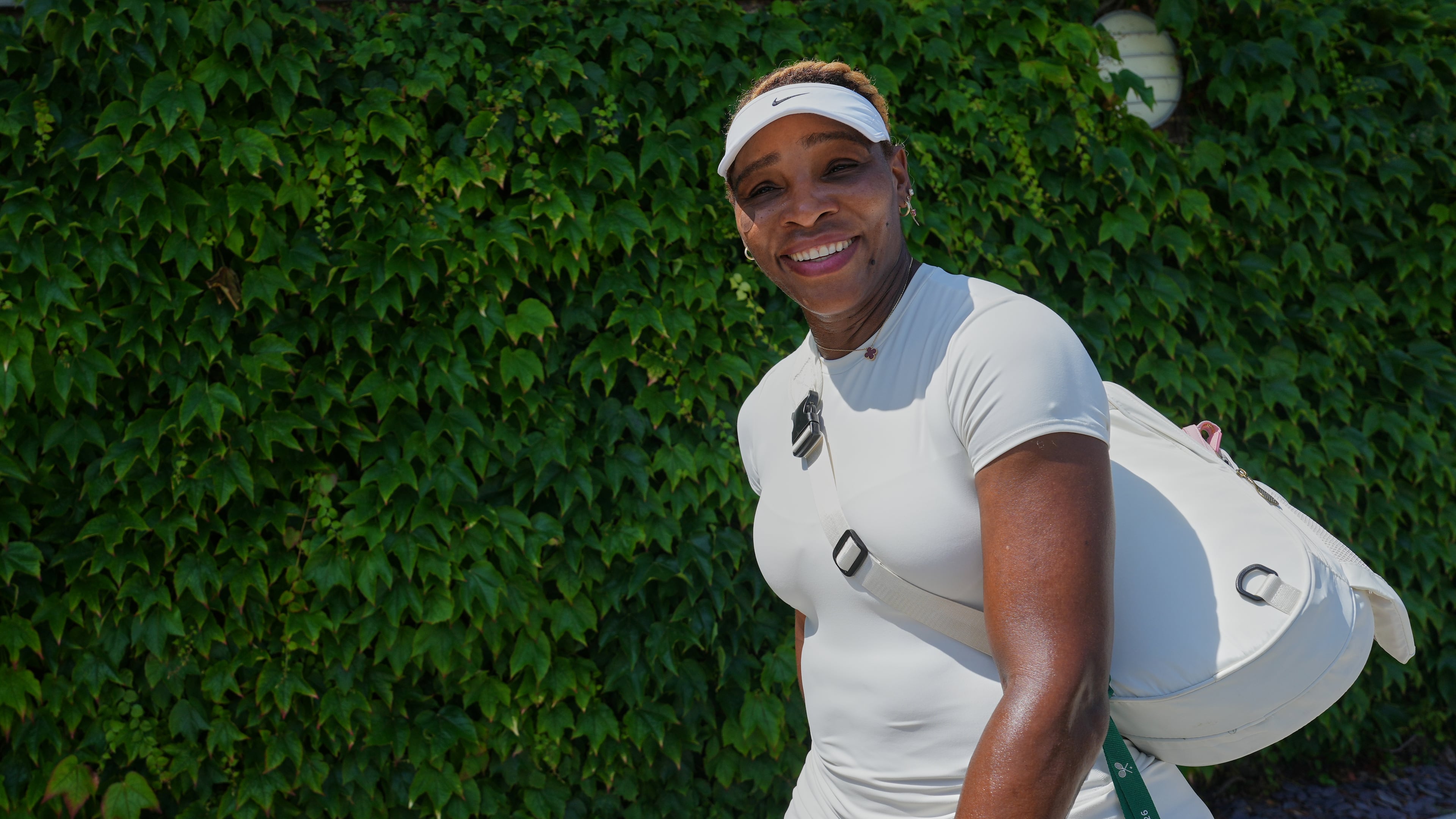Serena Williams of the United States smiles after a training session at the All England Lawn Tennis and Croquet Club, ahead of the Wimbledon Championships in London, Thursday, June 25, 2026. (AP Photo/Kirsty Wigglesworth)