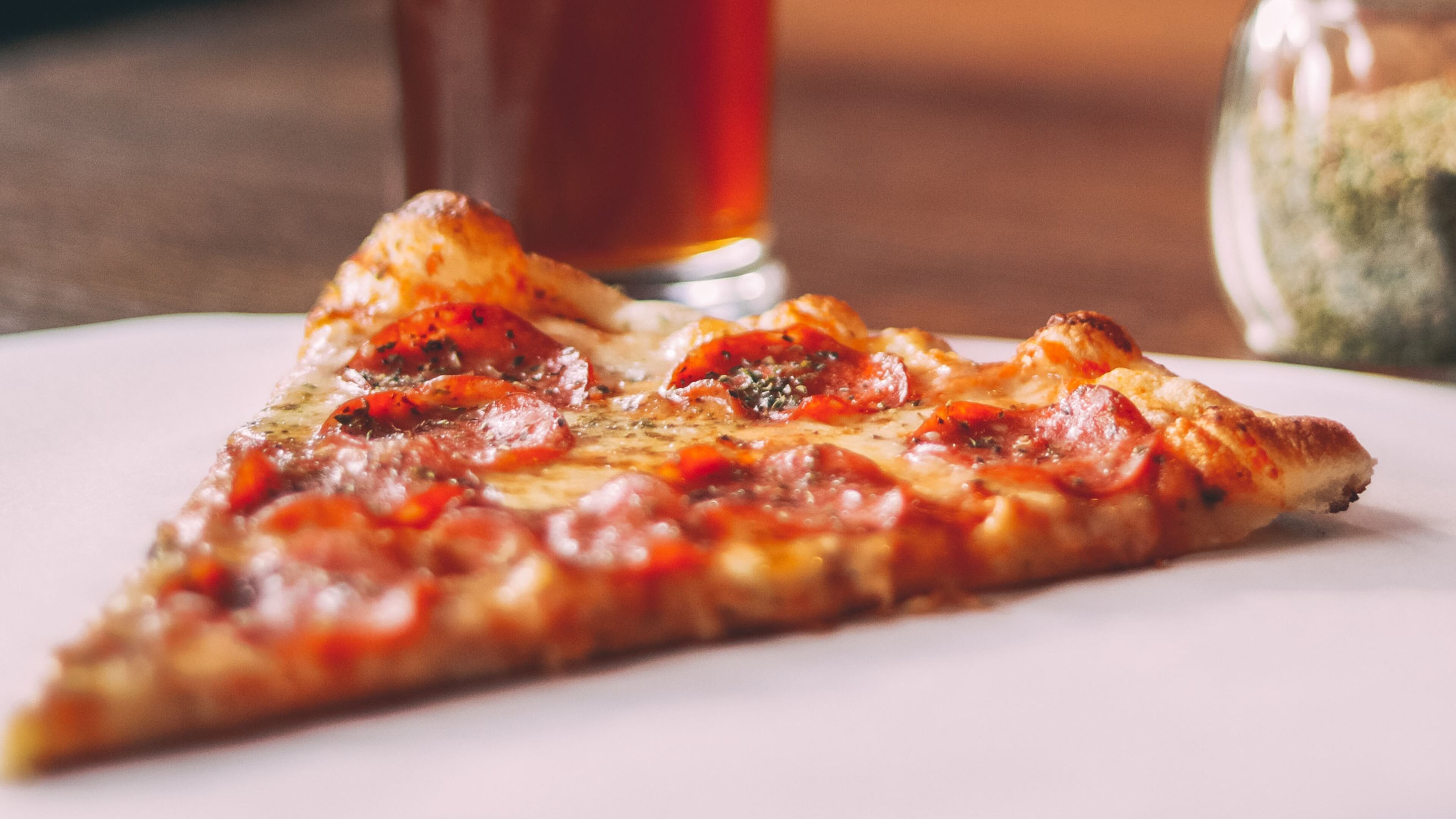 A local news report claims a man who crashed into a pizza restaurant walked out with a pizza, but police only say a mechanical error may have contributed to the crash.