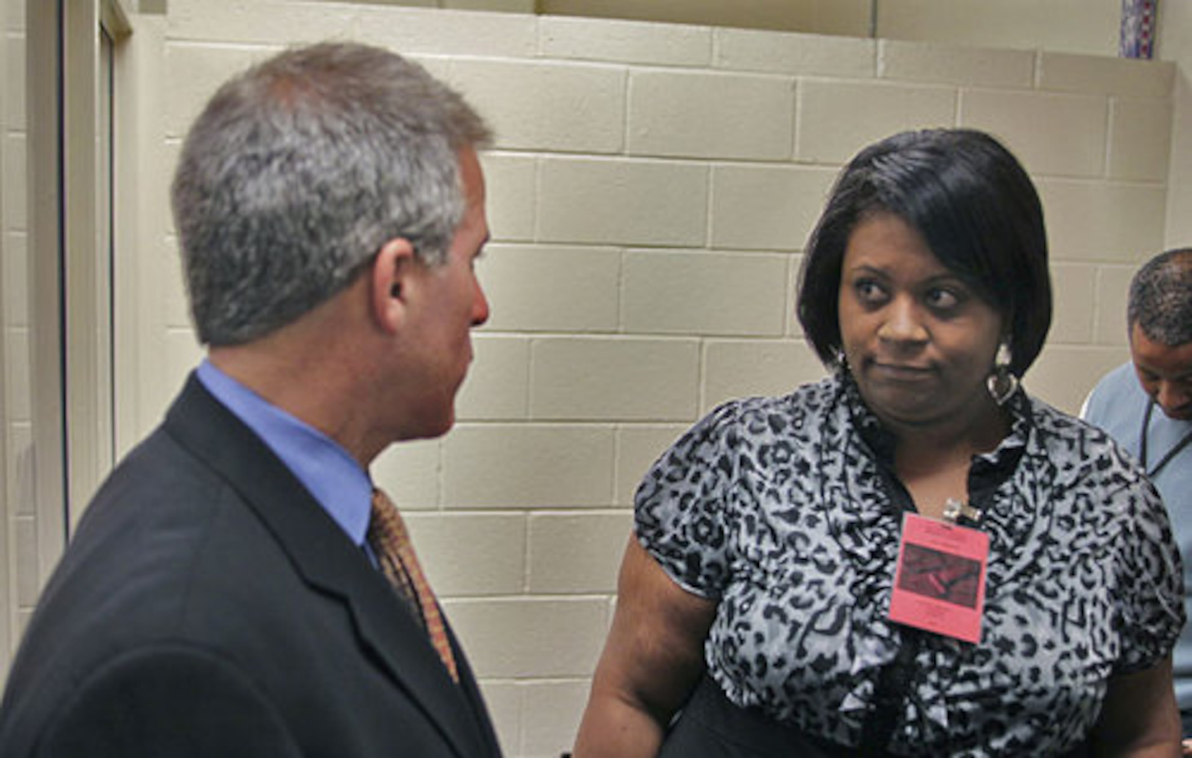 Attorney Brian Steel (left) talks with Sonya Dixon, mother of Javaris Crittenton (right) Friday. Attorney Brian Steel, who represents former basketball player and current murder suspect Javaris Crittenton, waived his first appearance at the Fulton County Jail Friday, Sept. 16, 2011.