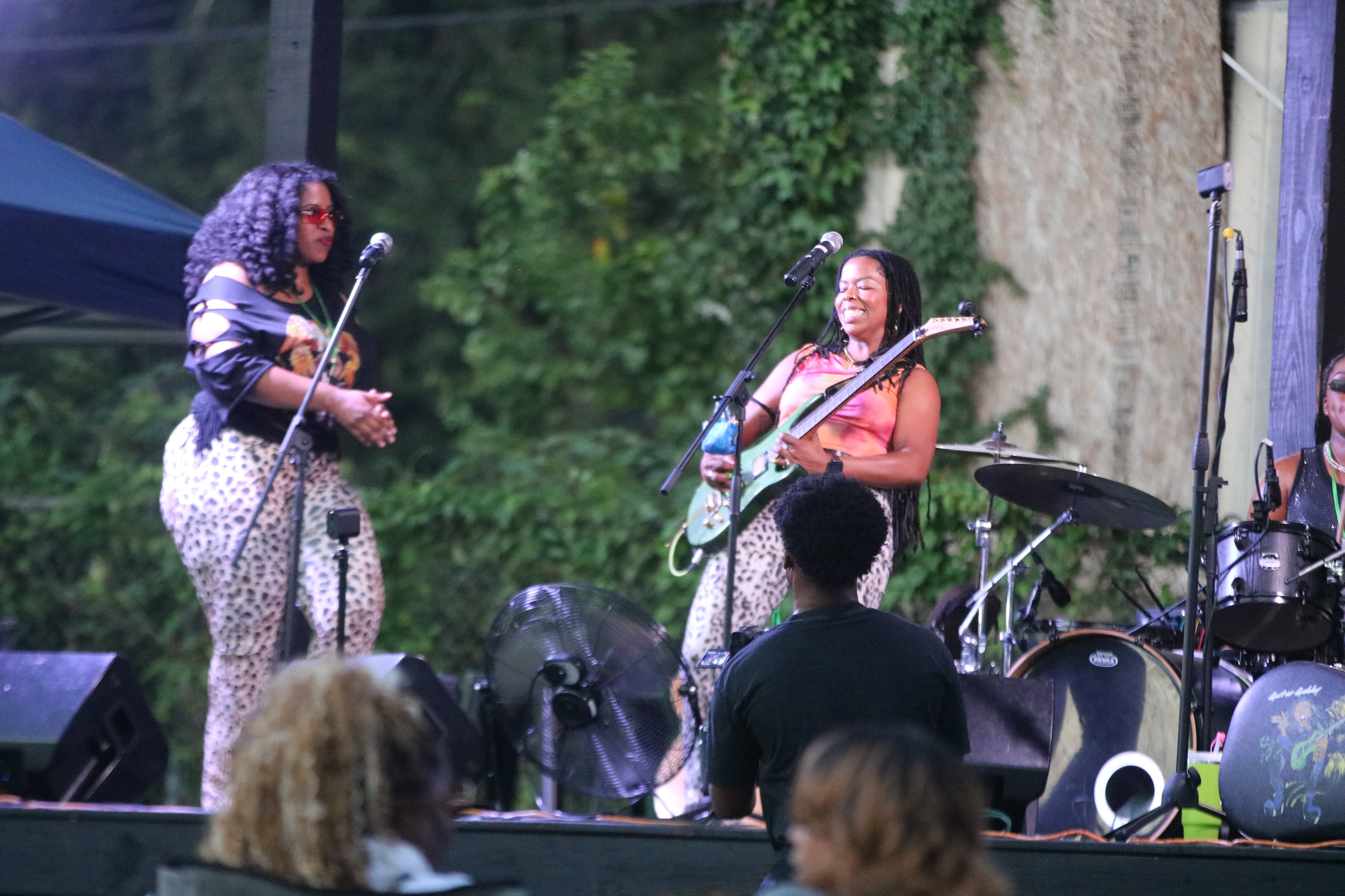 Gabriella “Guitar Gabby” Logan (right), whose rock fandom began when she was 11, is an Atlanta musician, lawyer and educator working to uplift more women of color rock musicians. (Courtesy of JohnLeeFrom1983/JayiKemp)