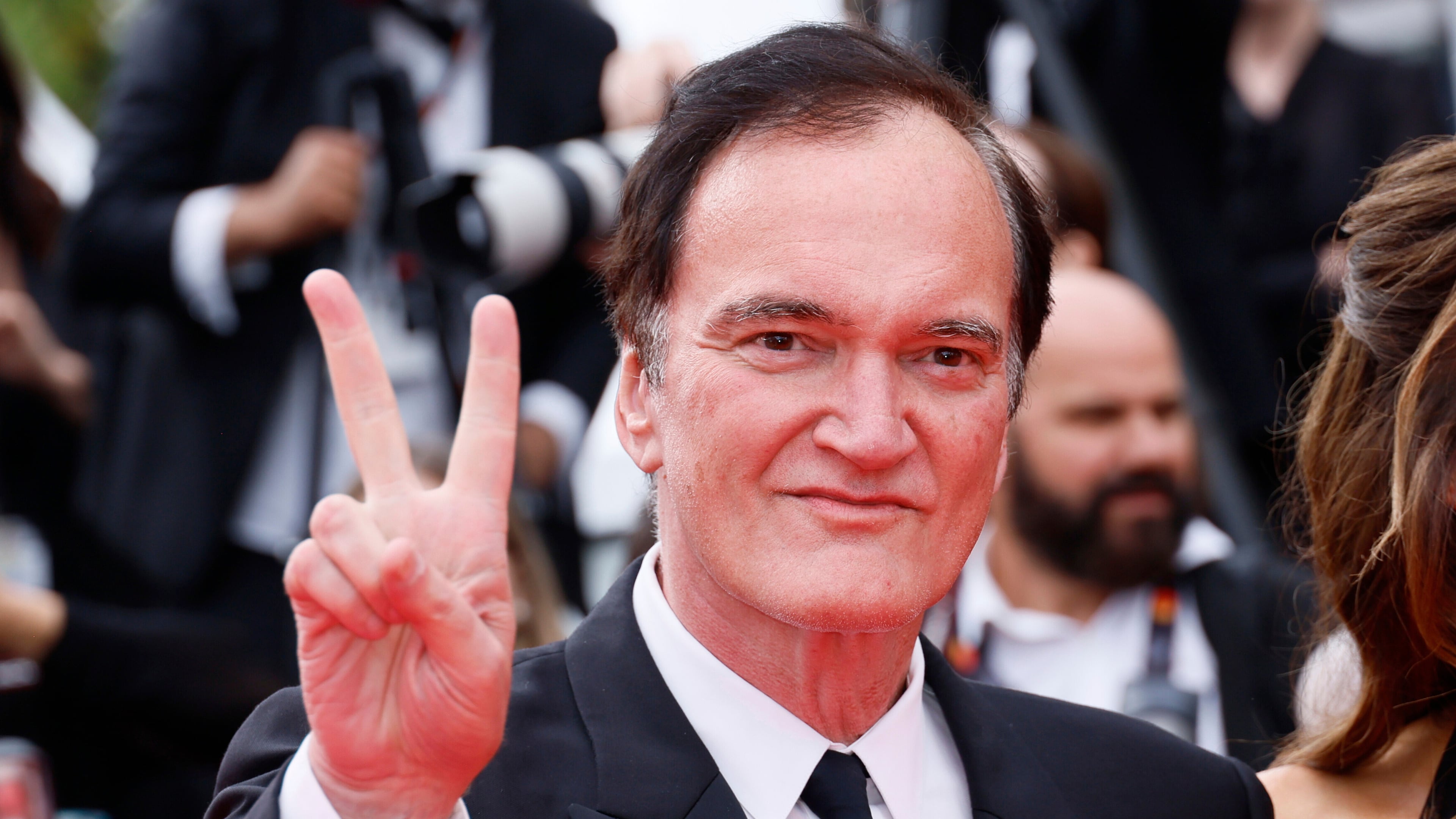 FILE - Quentin Tarantino poses for photographers upon arrival at the premiere of the film 'Nouvelle Vague' at the 78th international film festival, Cannes, southern France, Saturday, May 17, 2025. (Photo by Joel C Ryan/Invision/AP, File)