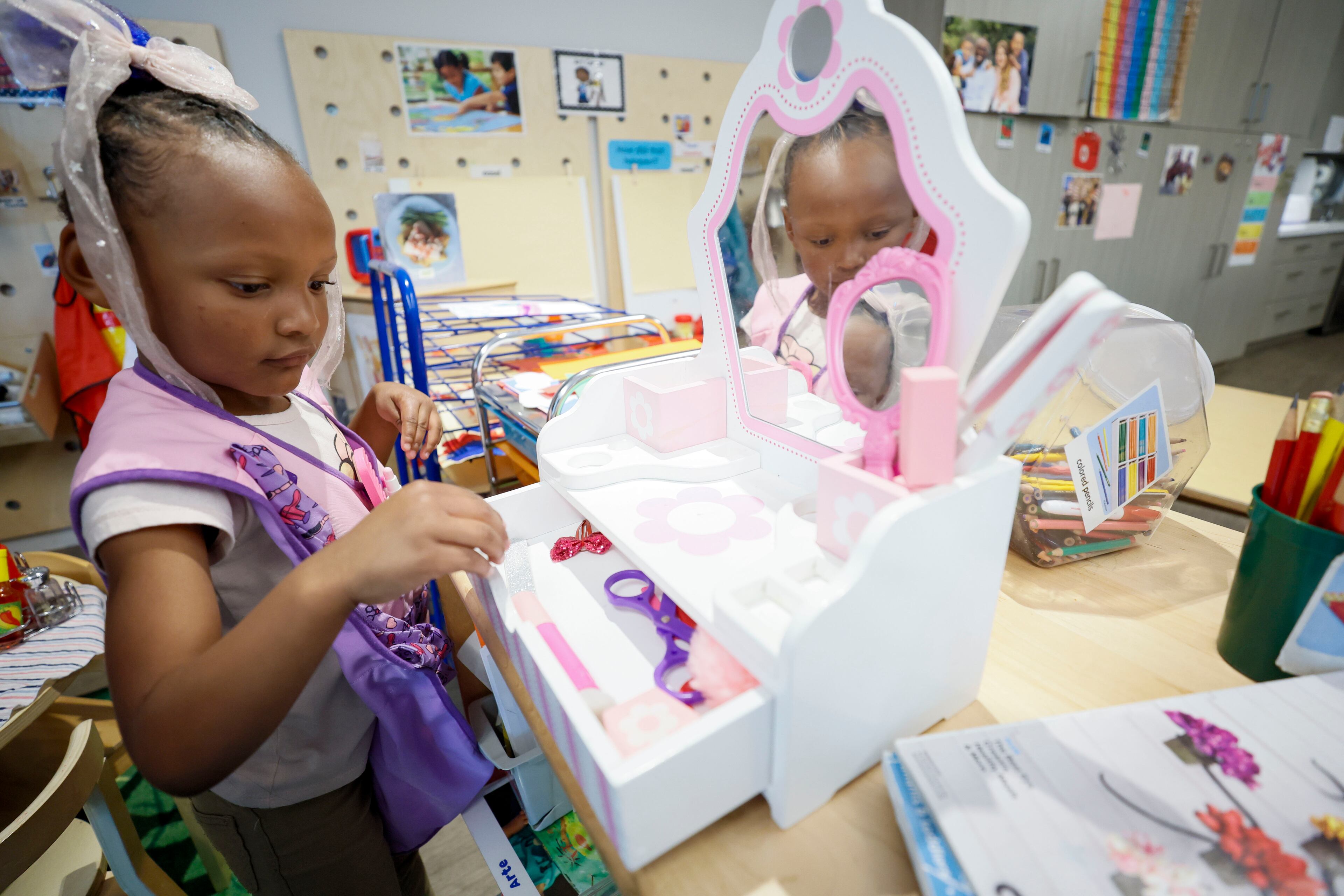 Children in the Head Start program engage in indoor activities at the Arthur M. Blank Early Learning Center on Monday. (Miguel Martinez/AJC)