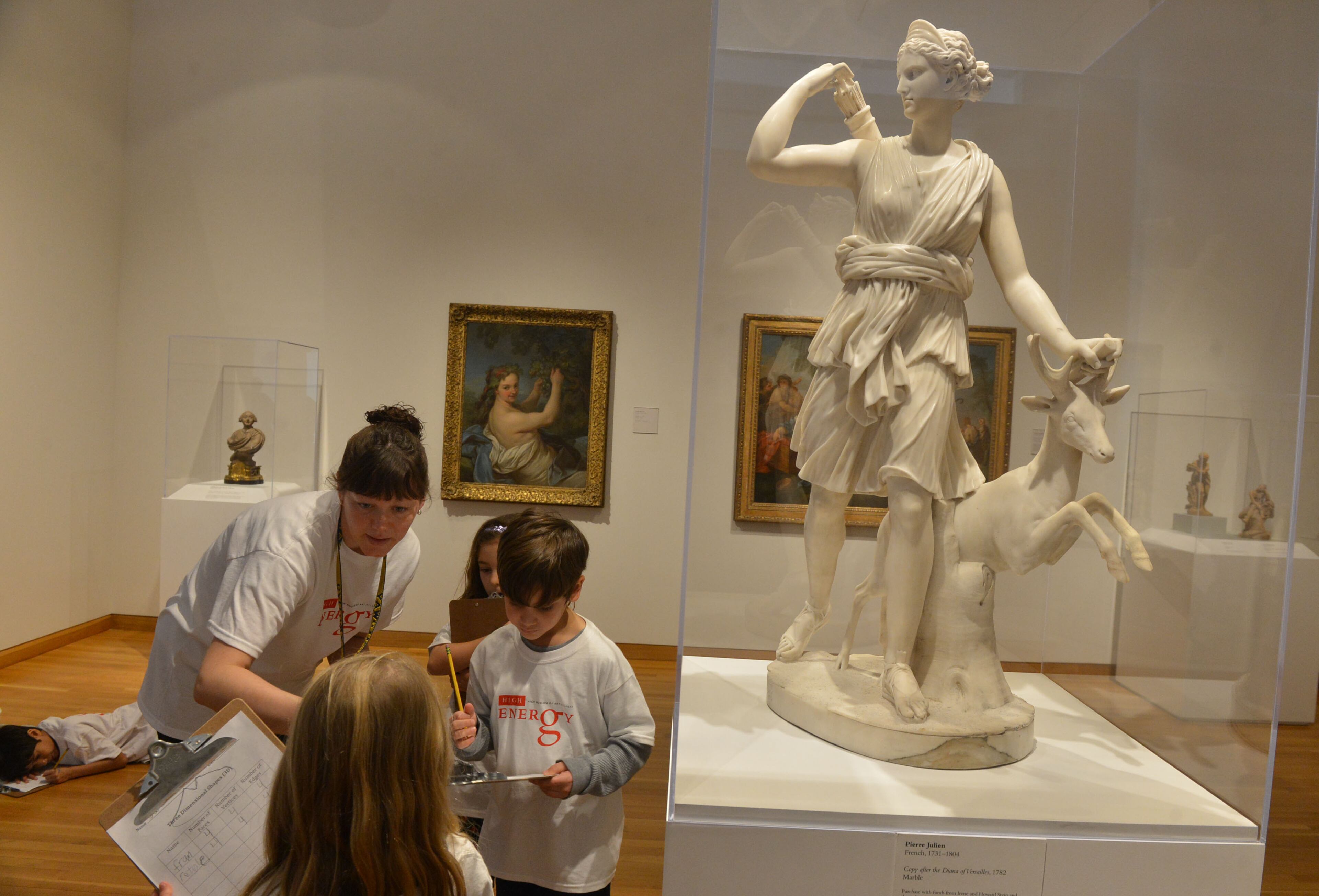 Teacher Molly Foos talks with first grade students near Pierre Julien's "Copy after the Diana of Versailles" during their school session at the High Monday, February 24, 2014. The High Museum has partnered with the Galloway School to offer their students a day of school with "no walls." The museum was closed completely Monday to allow these students - ages 3-18- the opportunity to learn all of their core subjects (math, reading, science, etc) through the different art exhibitions at the Museum. They interacted with the current art exhibitions at the High to learn their subjects. This is the first time the Museum has allowed an entire school to come in and learn for the day. Galloway is the first school in Atlanta (and the state of GA) to experience school with no walls.