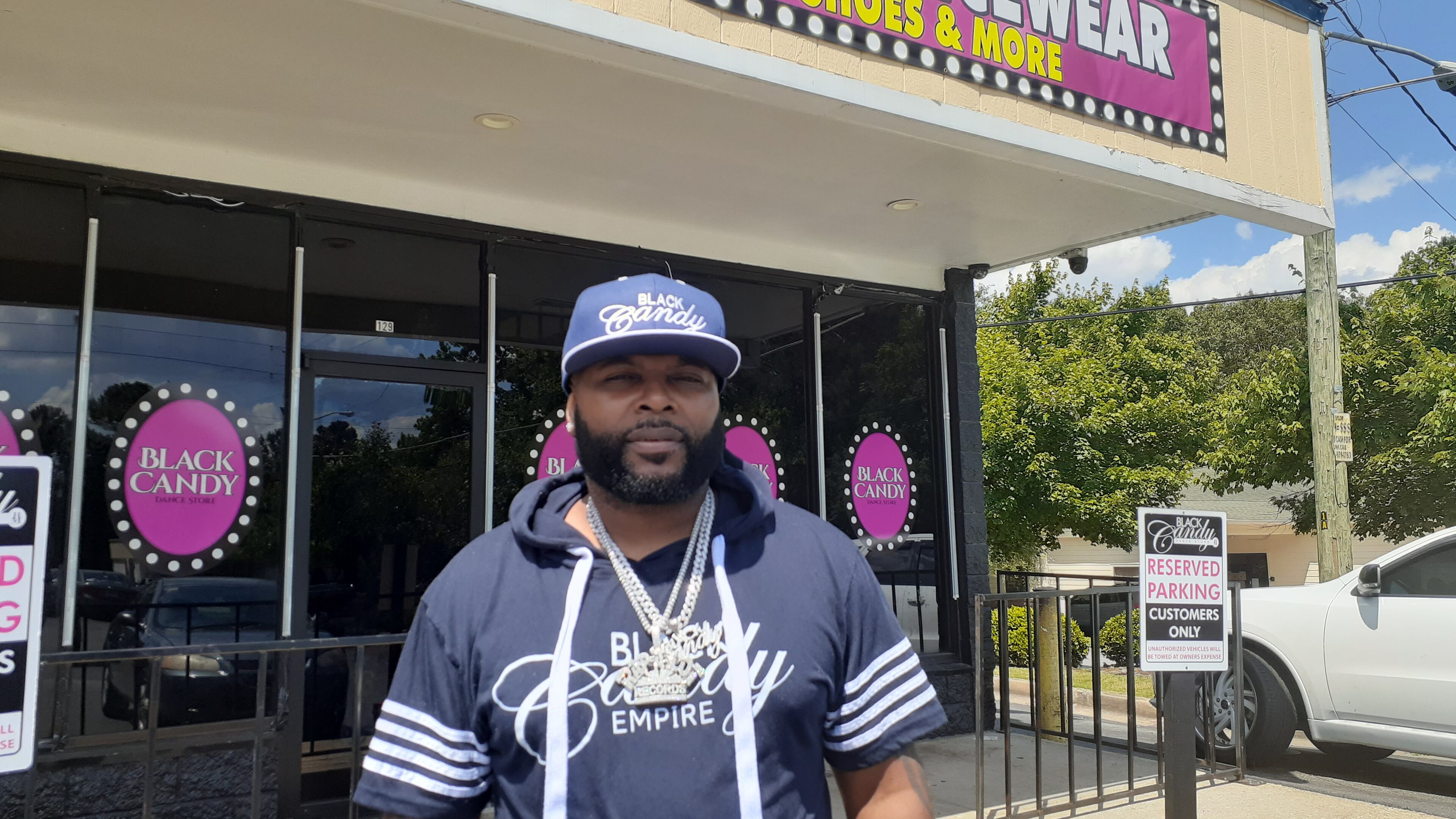 Black Candy owner George "Horseman" Durham stands outside his new custom dancewear shop in Austell on Wednesday, June 16, 2021. (Photo by Matt Bruce for the AJC)